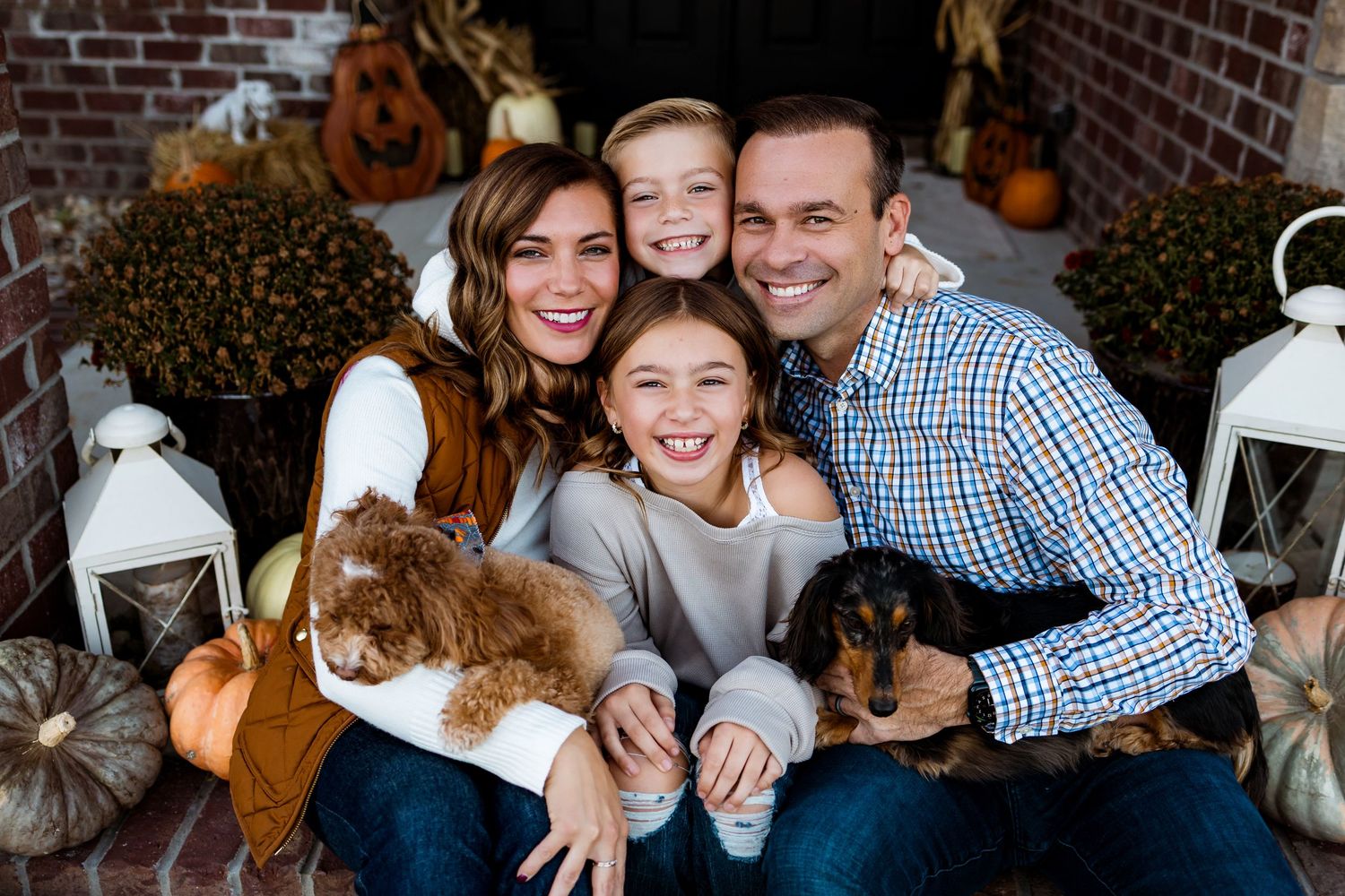 Collage of people laughing and embracing at a rustic outdoor fall setting with pumpkins and brick wall backdrop.