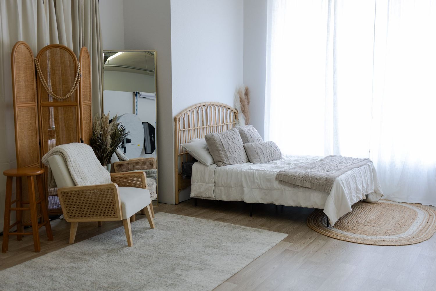Bright lifestyle photography area with neutral furniture and natural light inside the TLP studio in Edwardsville