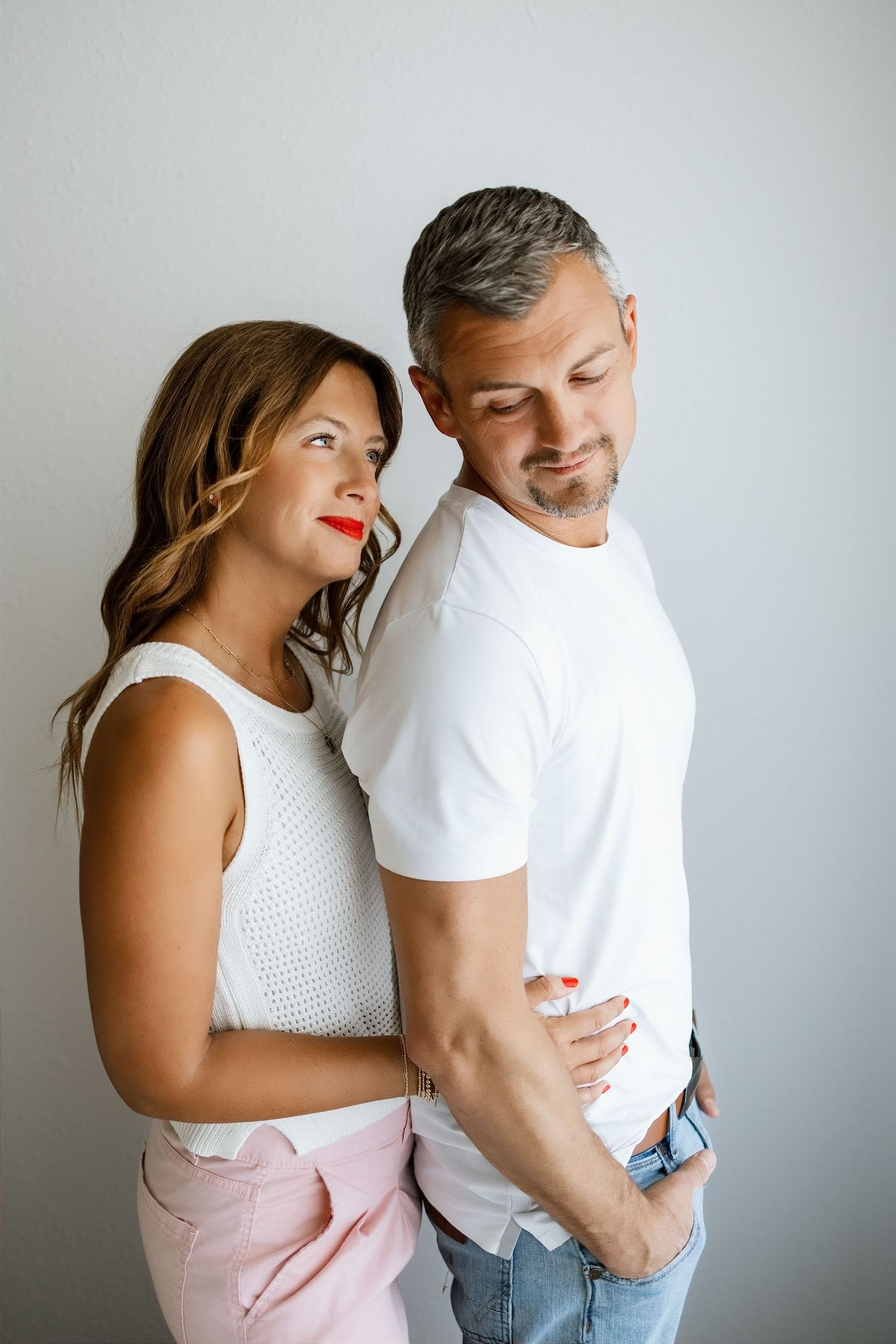 Podcast co-hosts standing together during a clean and modern branding photography session in Edwardsville