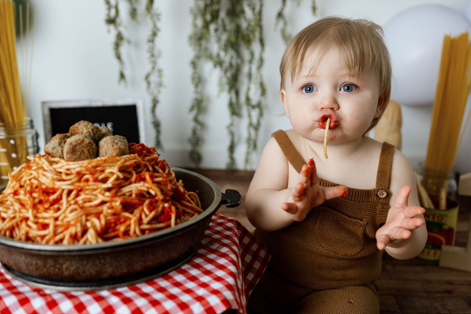 A series of photos showing spaghetti and meatballs being served and enjoyed at a rustic wooden dining table.