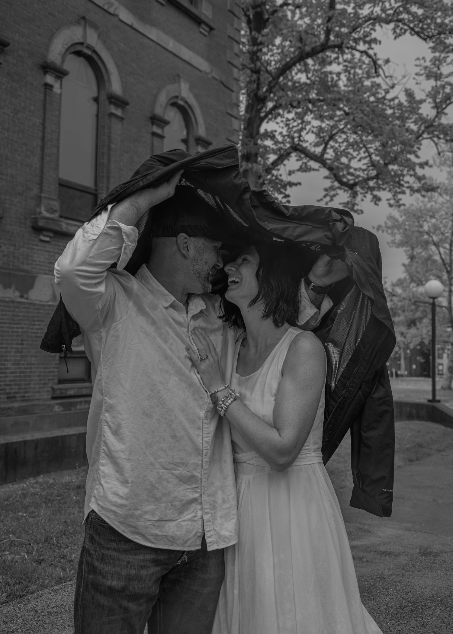 Couple portrait photographed downtown in the rain