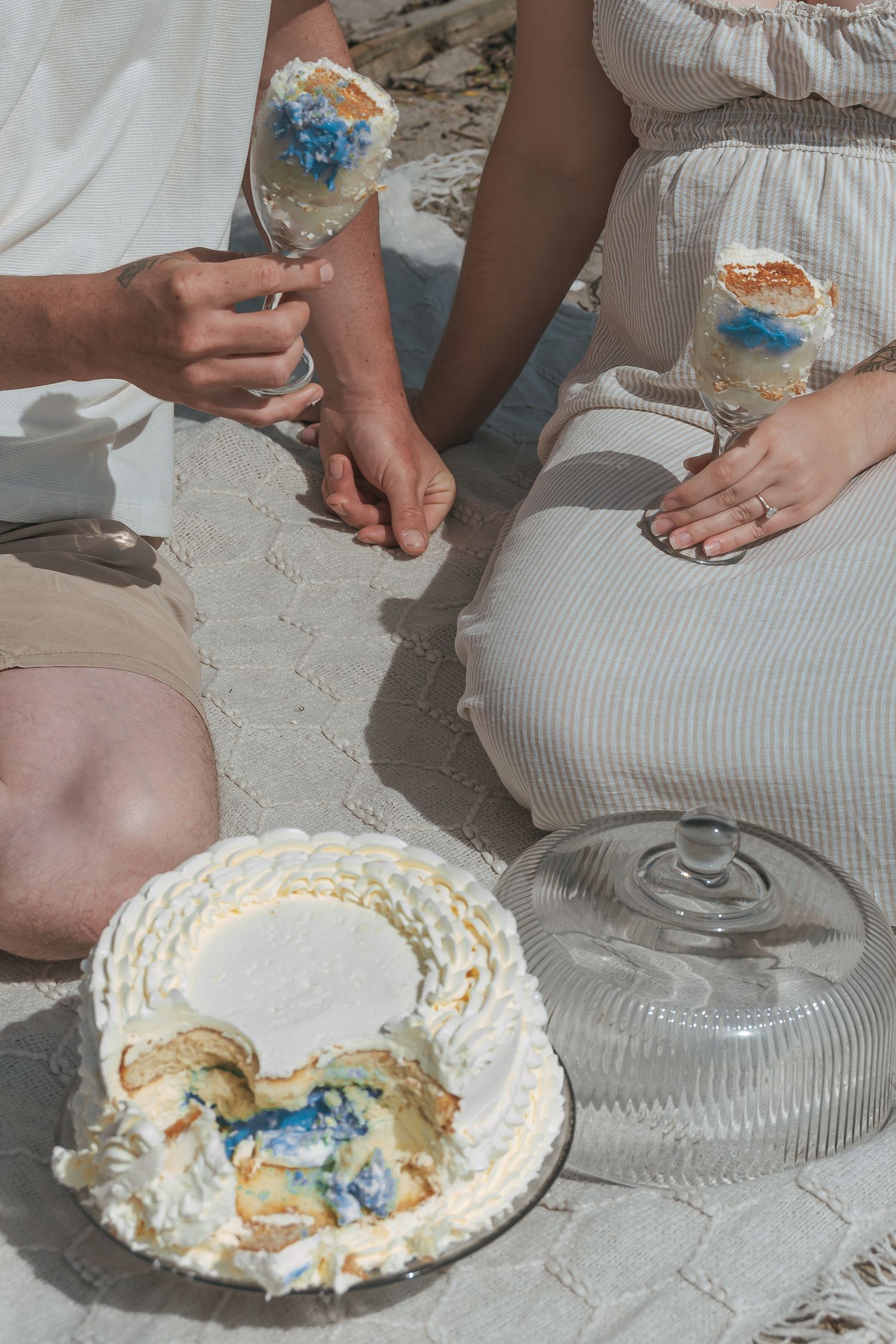 Cake gender reveal on beach