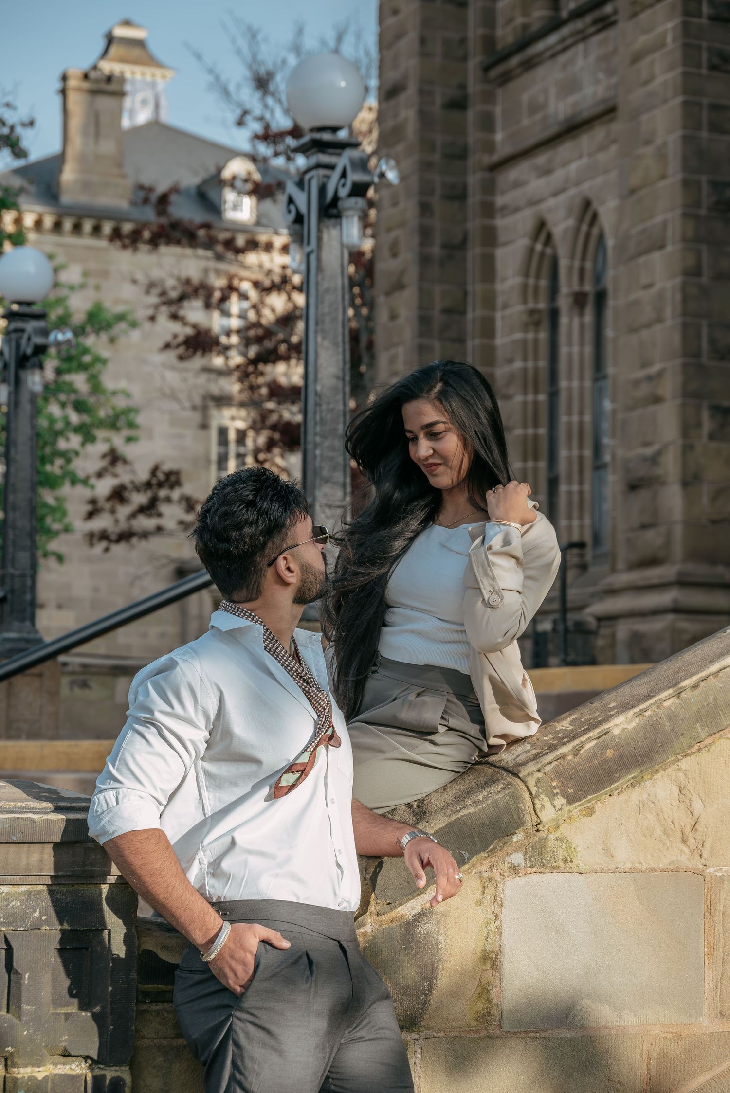 Couple portrait photographed outdoors in a relaxed setting in Prince Edward Island.