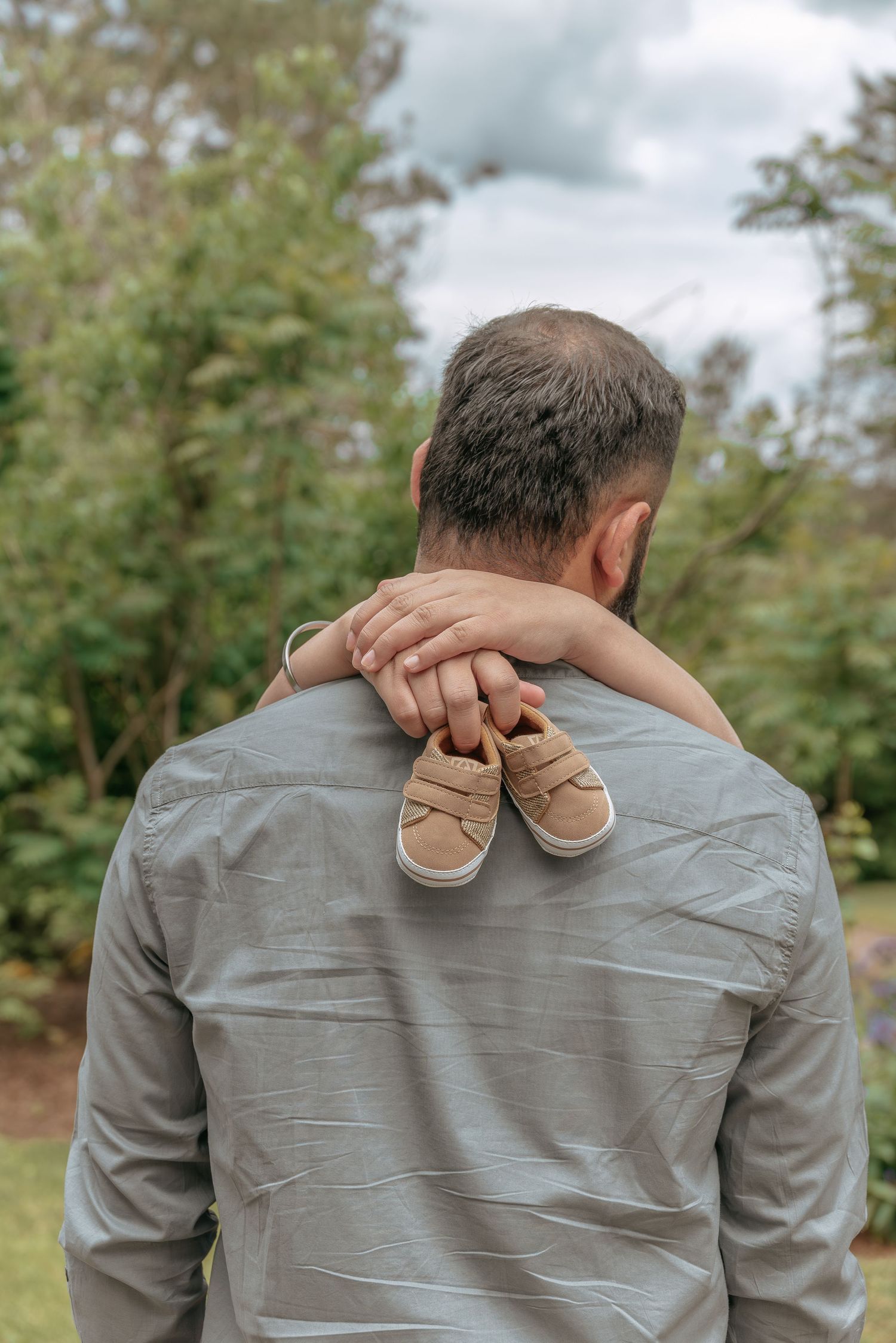 Couple maternity session photographed in a park in Prince Edward Island.