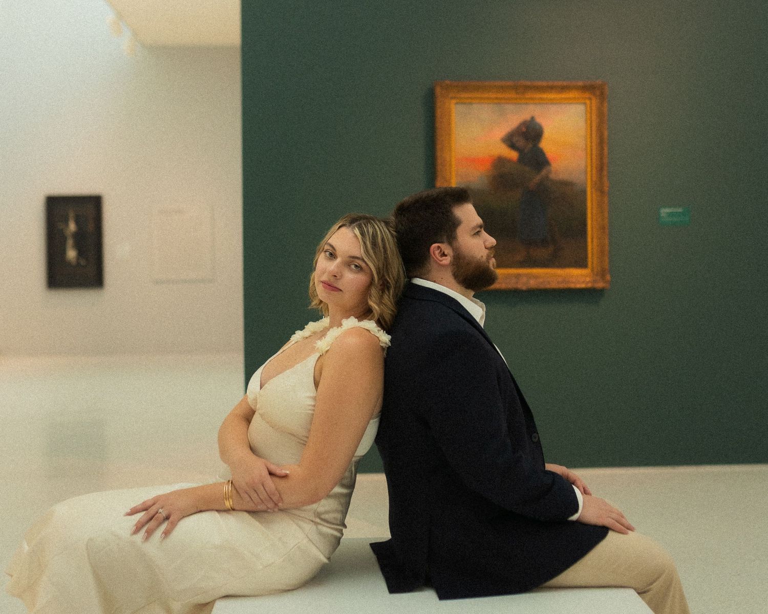 A series of minimalist photographs showing couples in intimate poses against neutral backgrounds.