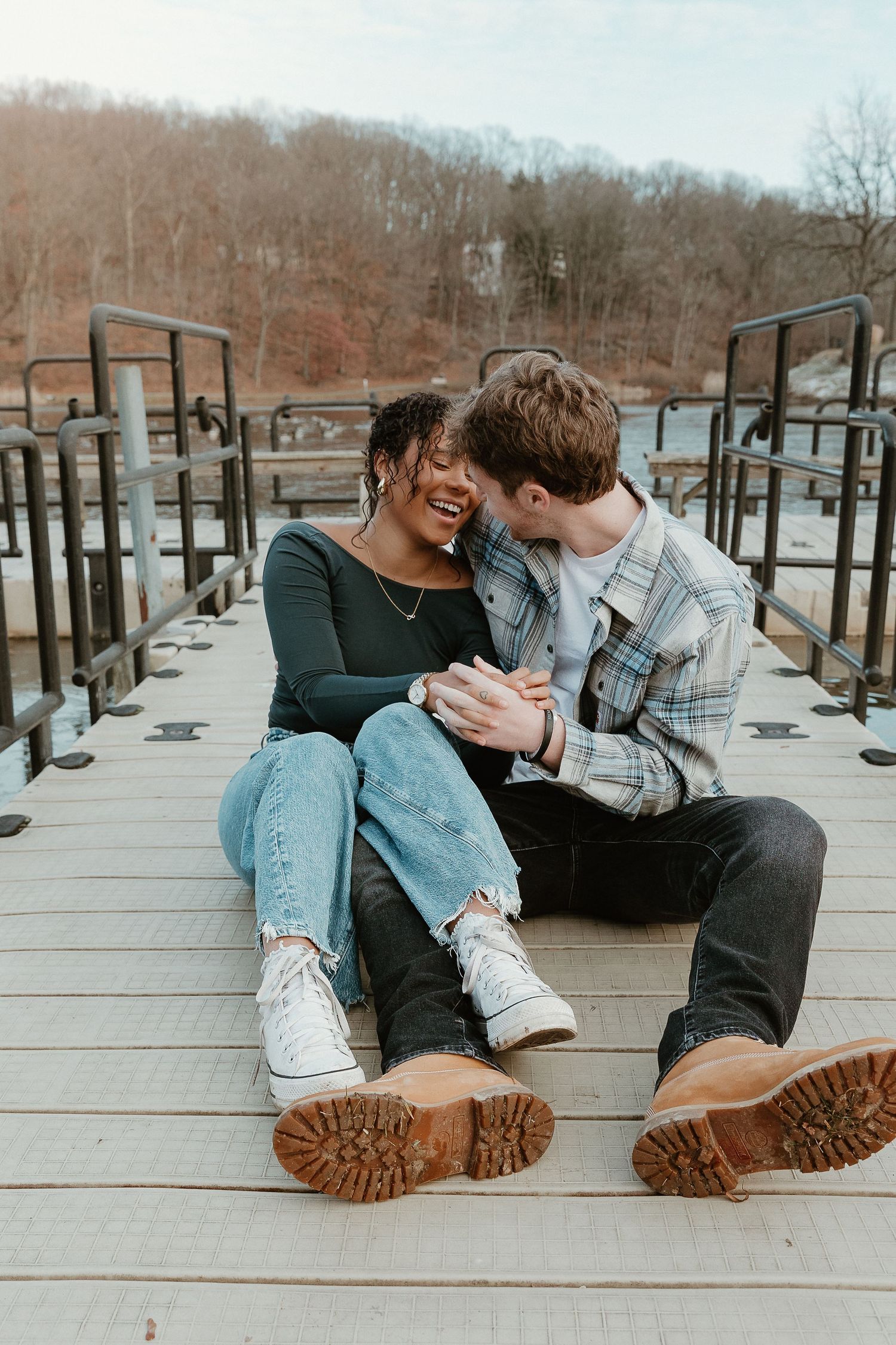 Genuine joy on the dock steps, couples session with film-inspired tones, candid storytelling that feels like a memory.
