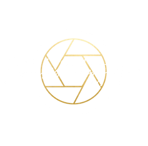 White text and gold logo design for Published Photographer with circular emblem on black background.