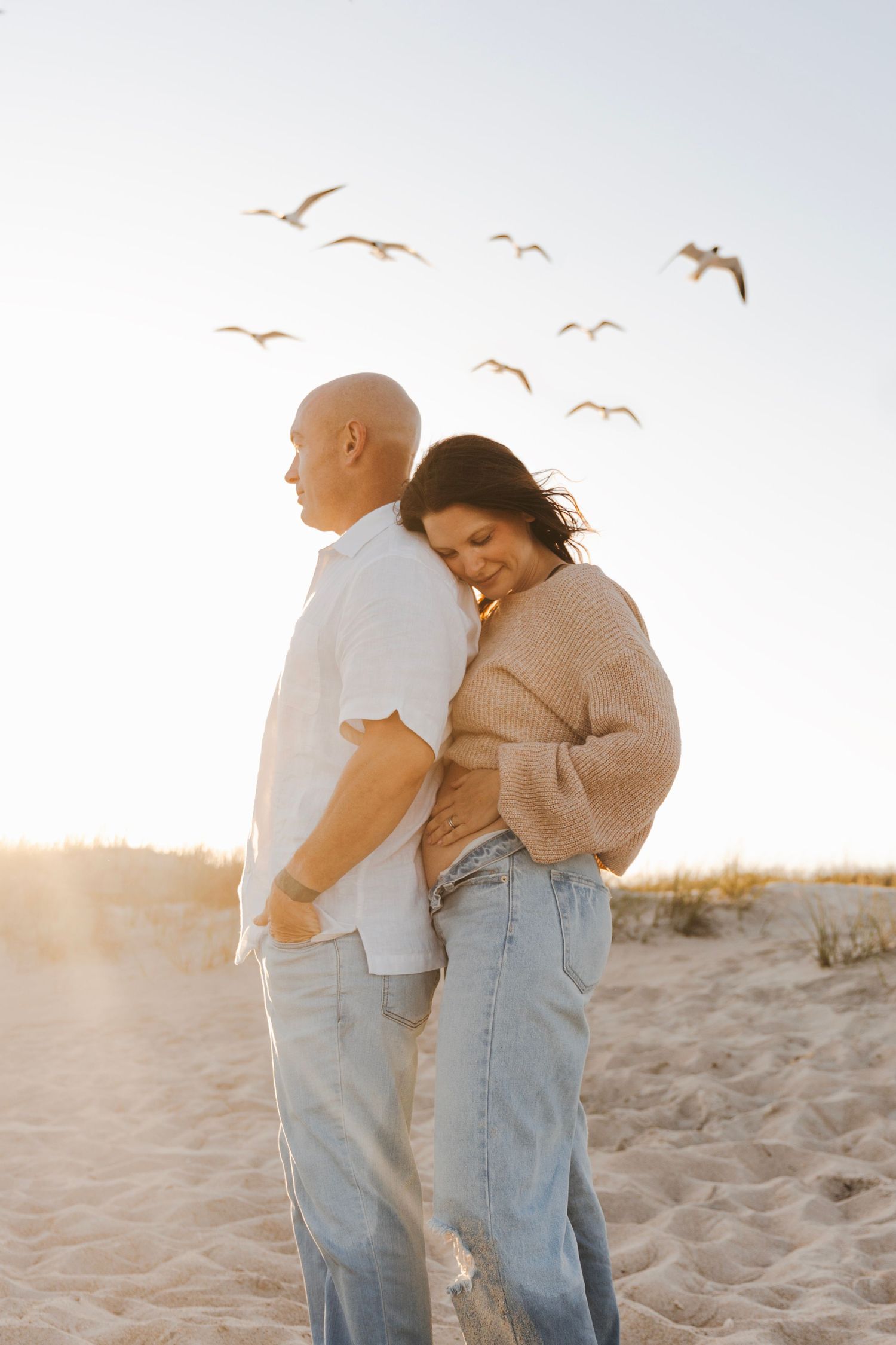 Candid lifestyle beach session, families, couples, and maternity sessions. Emerald Isle, Surf City, Wilmington NC by AKL Photo & Films.
