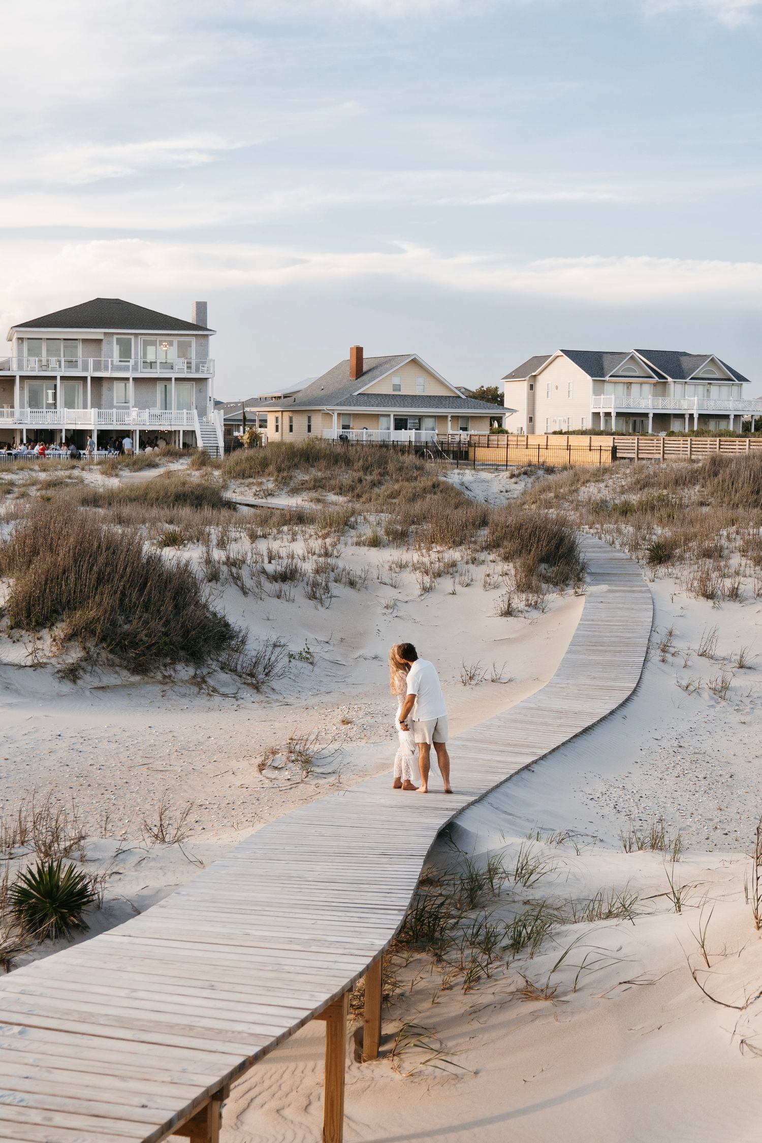 Candid wedding at the beach, rehearsal dinner. Emerald Isle, Surf City, Wilmington NC by AKL Photo & Films.