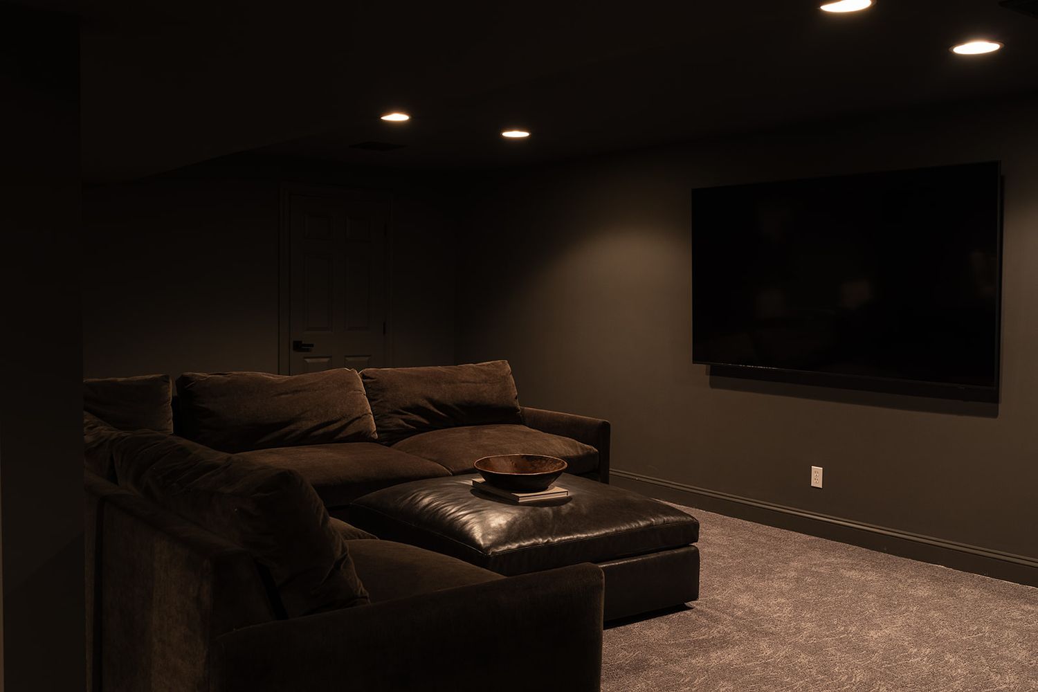 A sequence of seven interior room views shows the same space progressively getting darker until completely black.