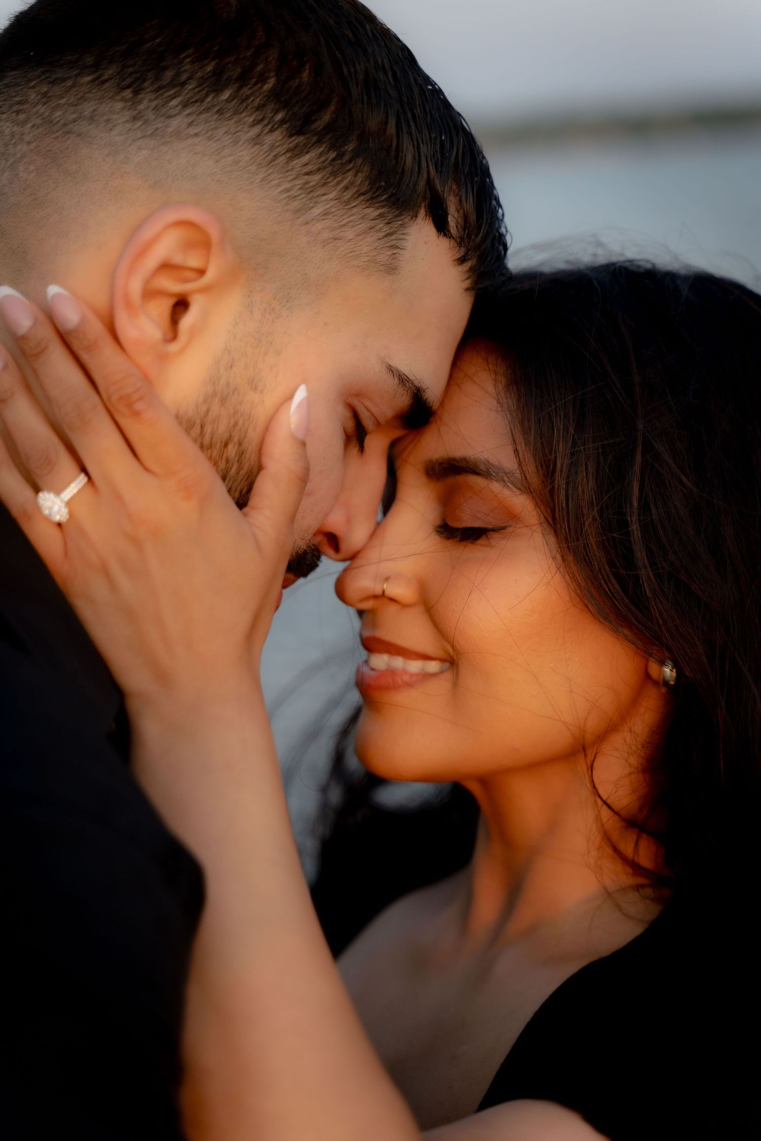 Couple being cozy that just got engaged