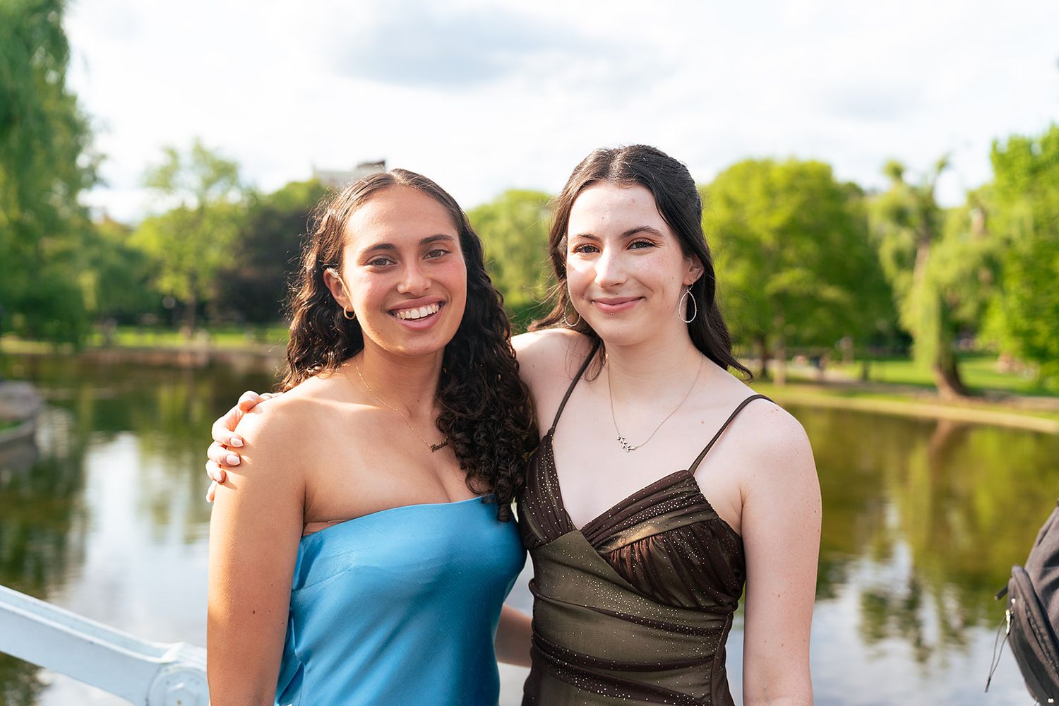 Two girls pose on the bridge at Boston Public Garden
