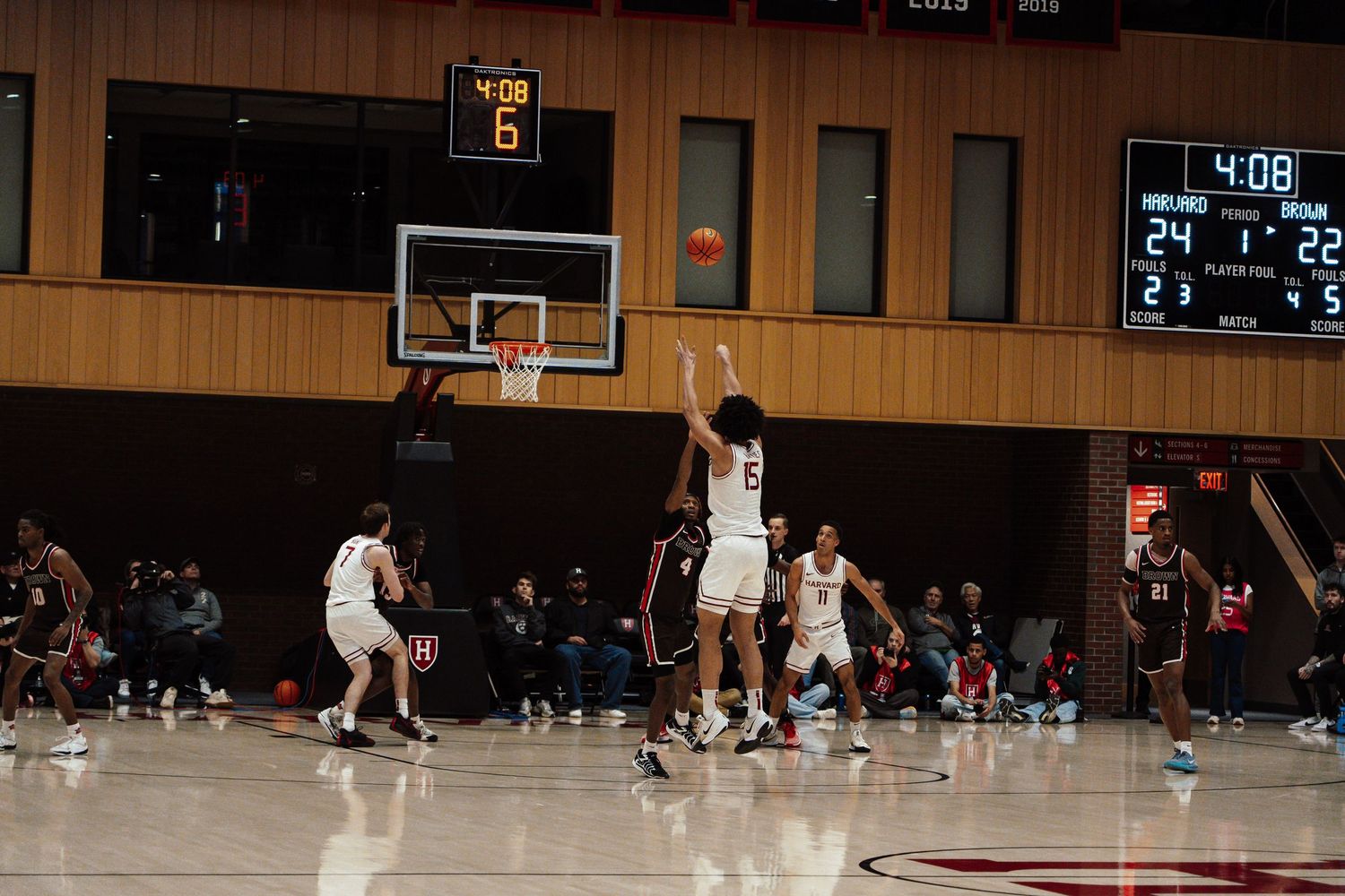 A basketball player shoots a penalty shot.