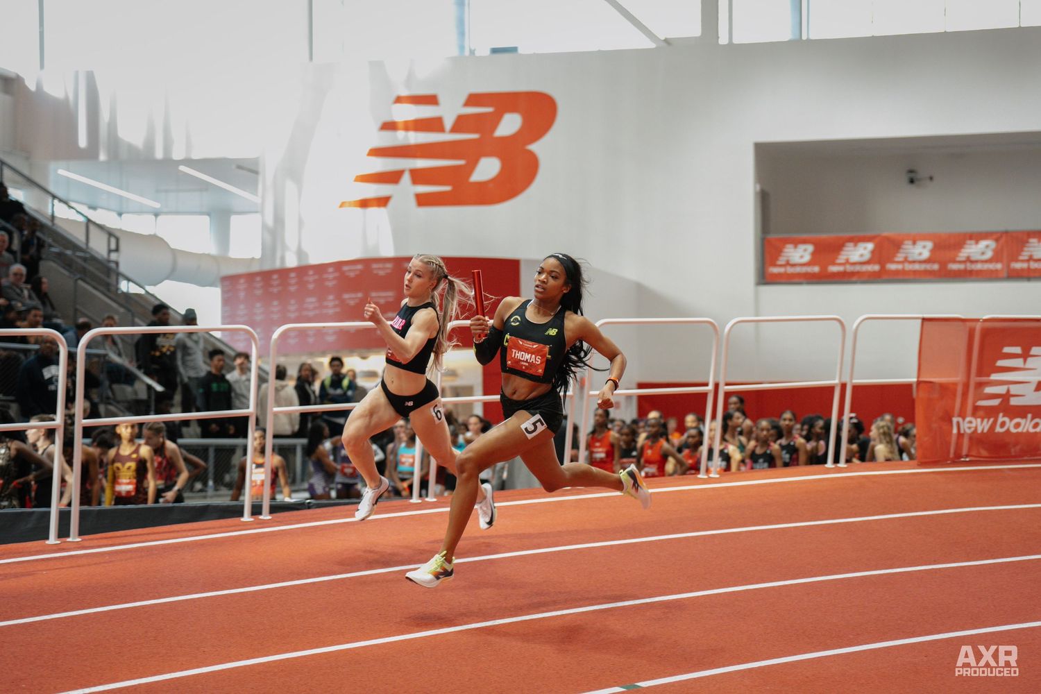 A girl dashes down the track