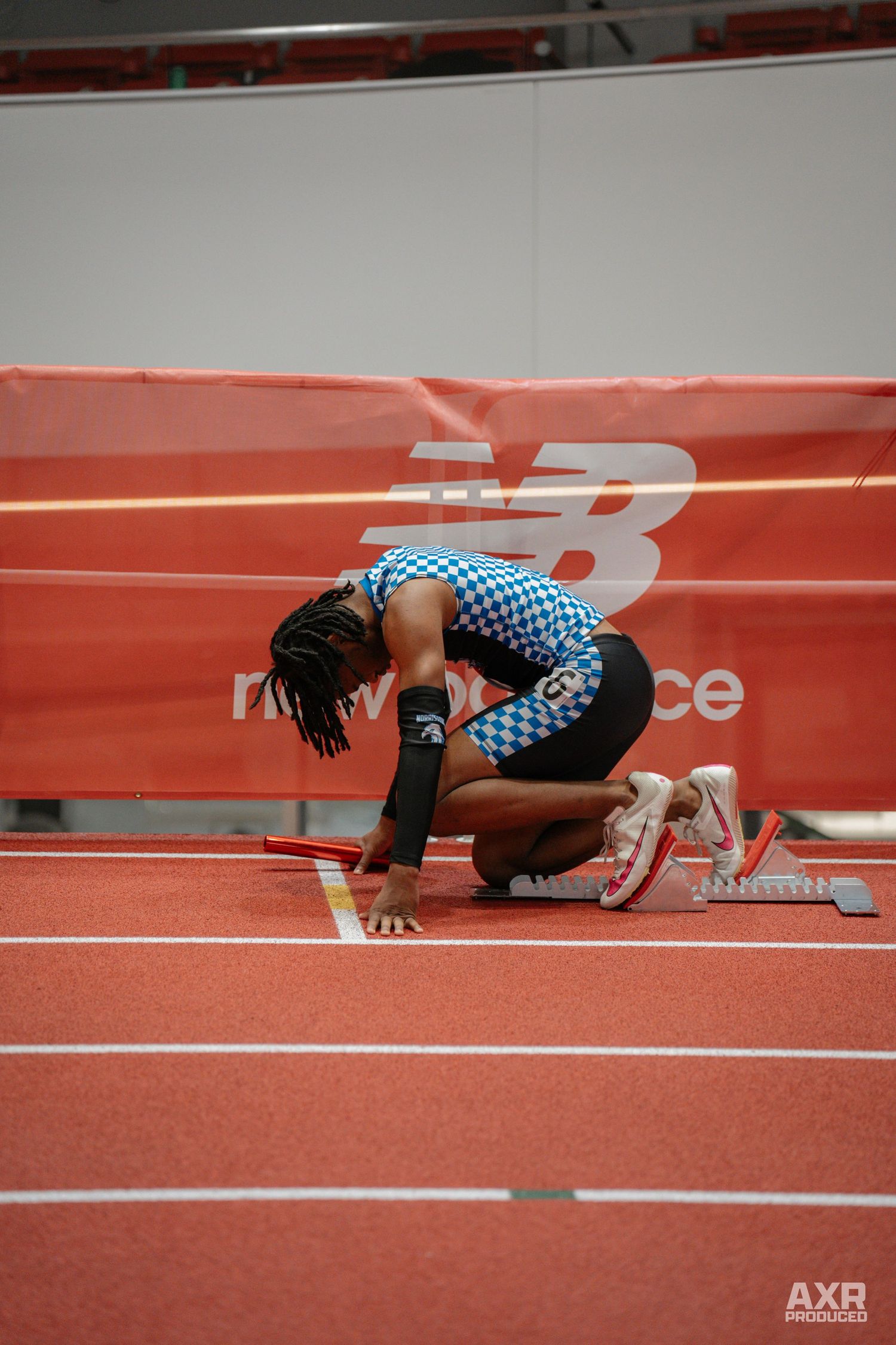 A guy prepares himself for a race.