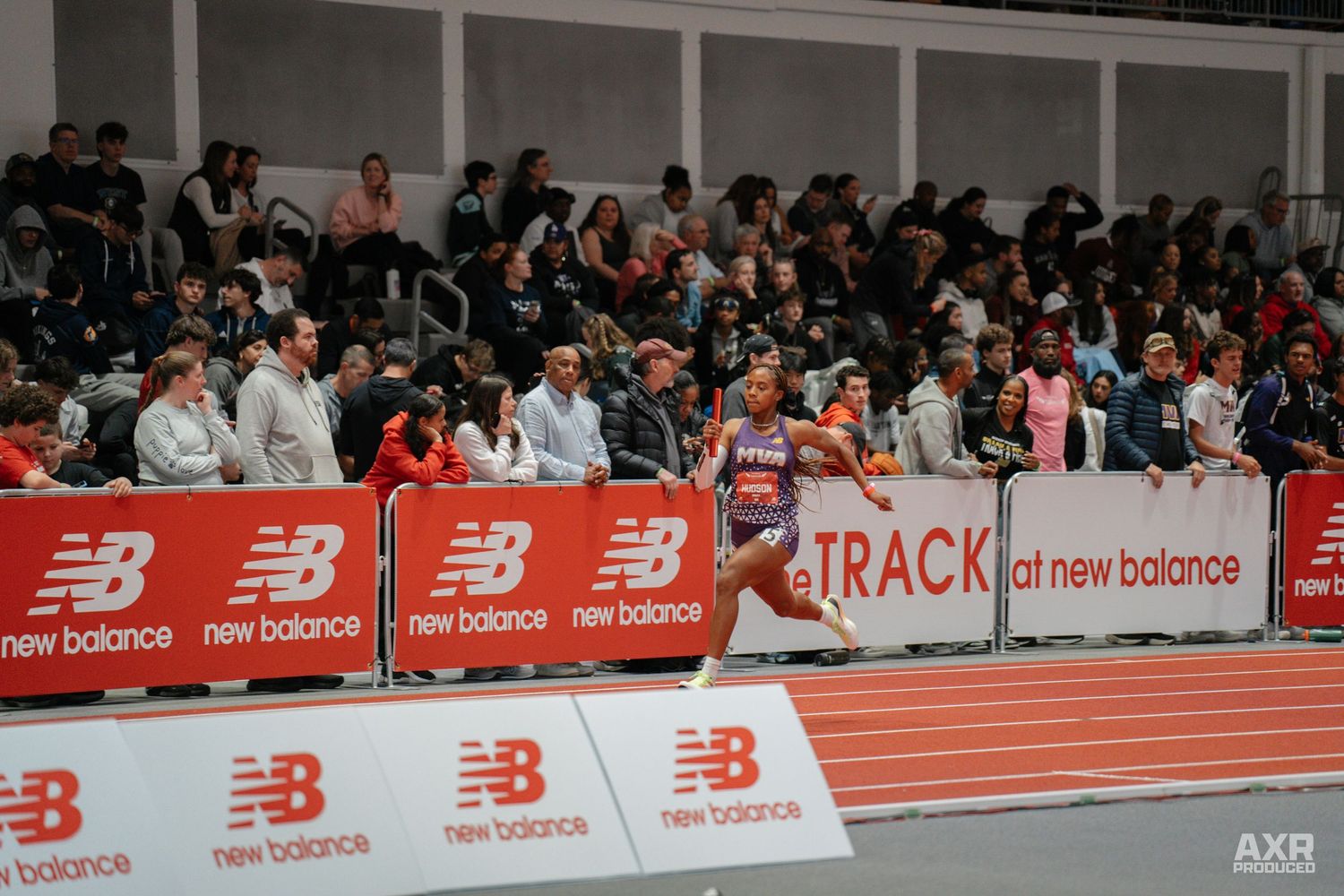 A girl dashes down the track