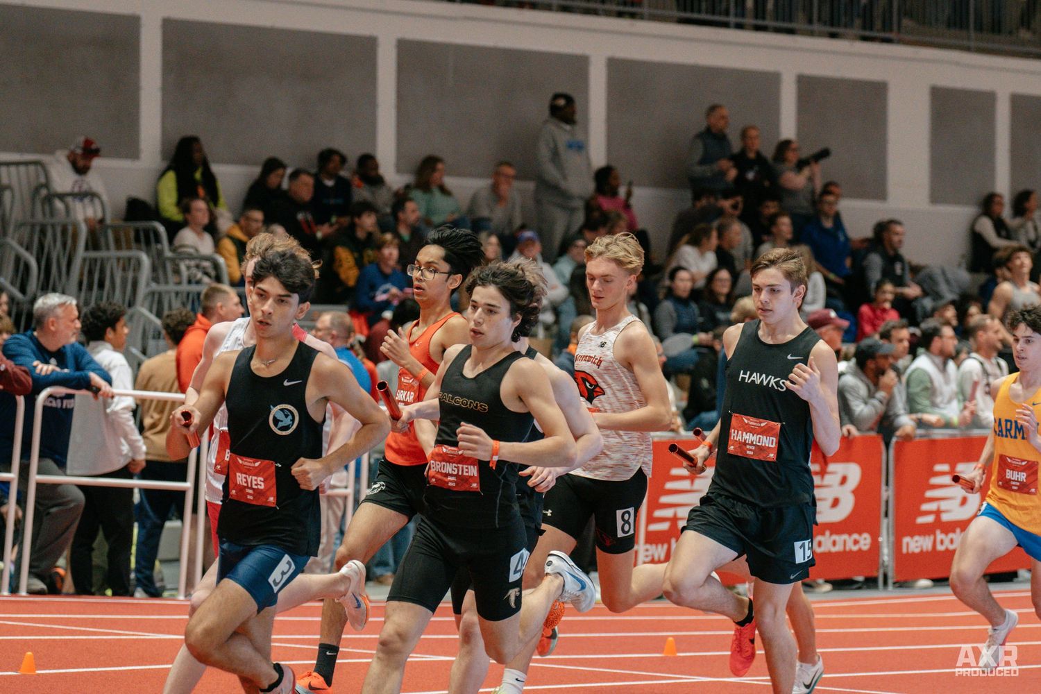 Track kids run a relay 2 mile