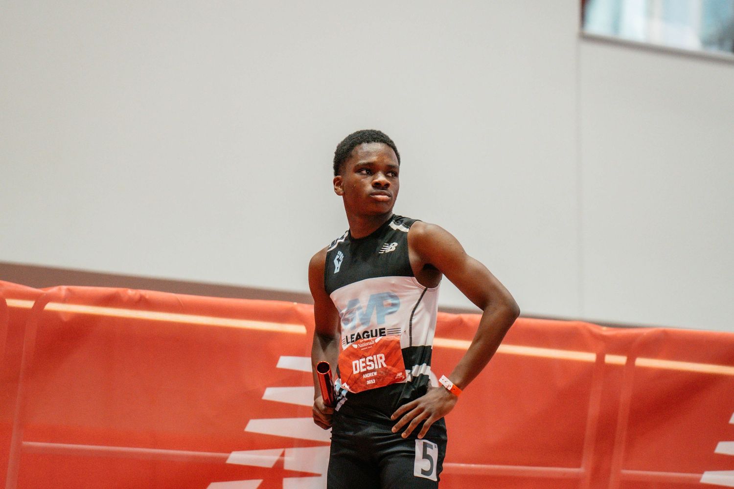 A guy looks for his coach before his race.