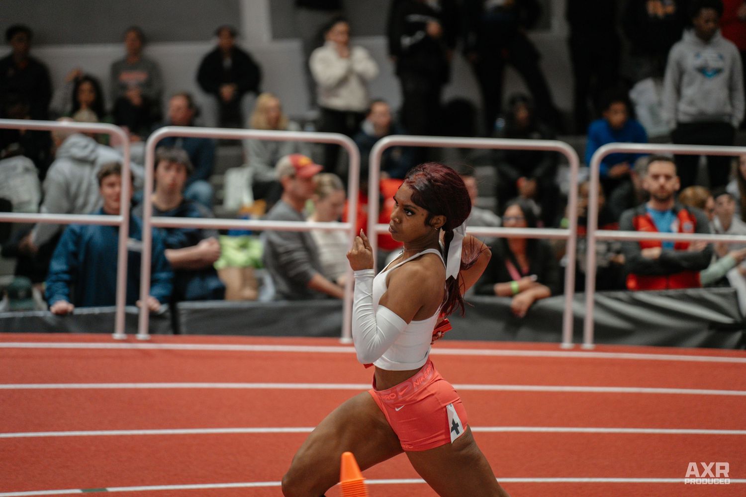A girl dashes down the track