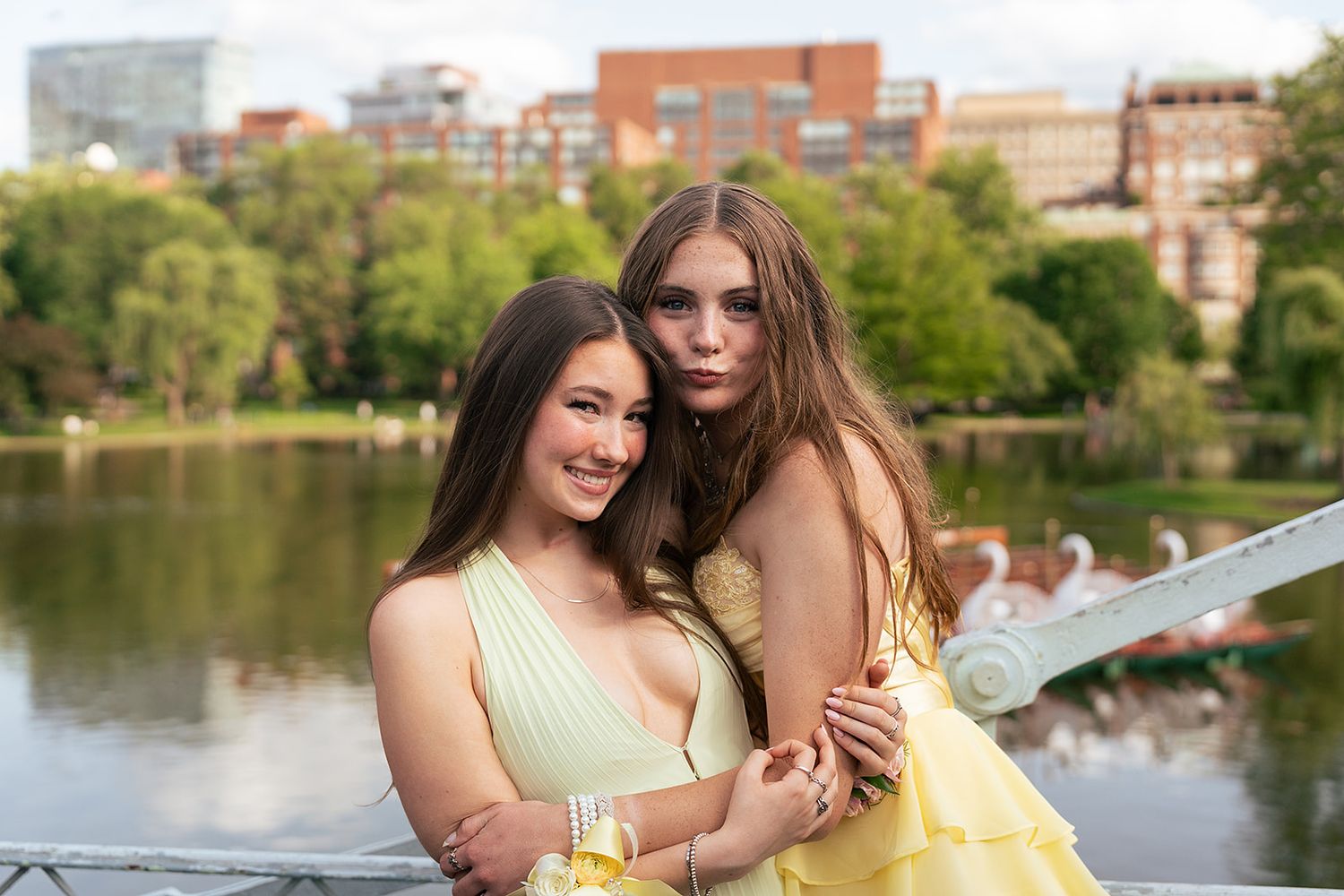 Two girls pose on the bridge at Boston Public Garden