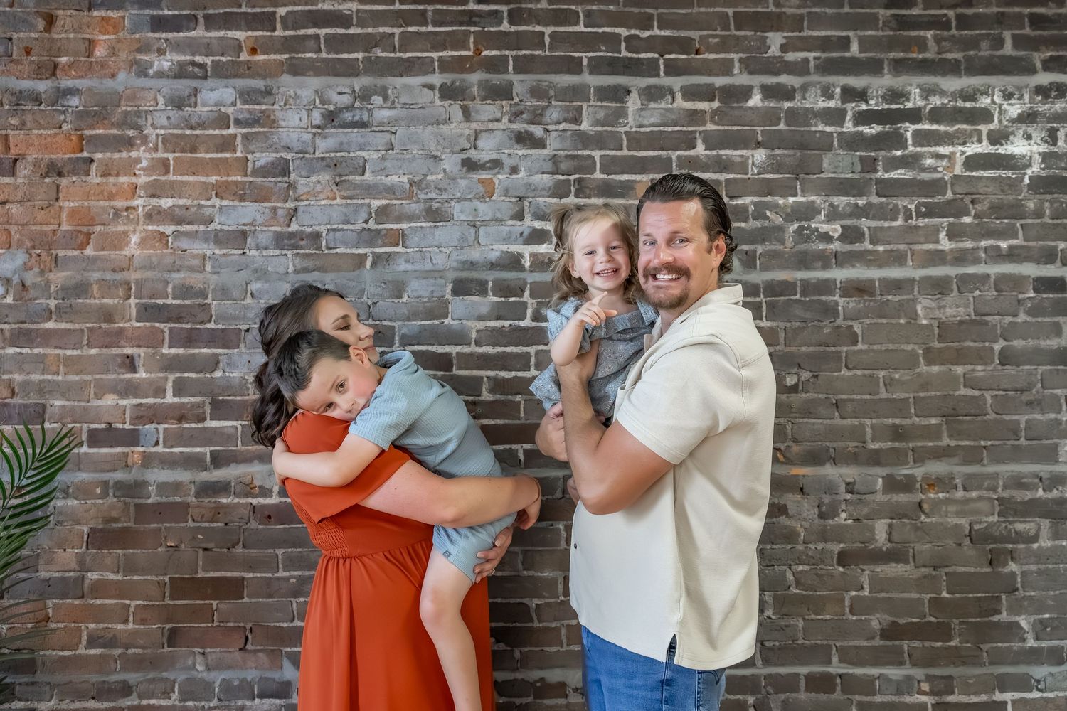Lifestyle family photography session showing genuine moments of connection.
