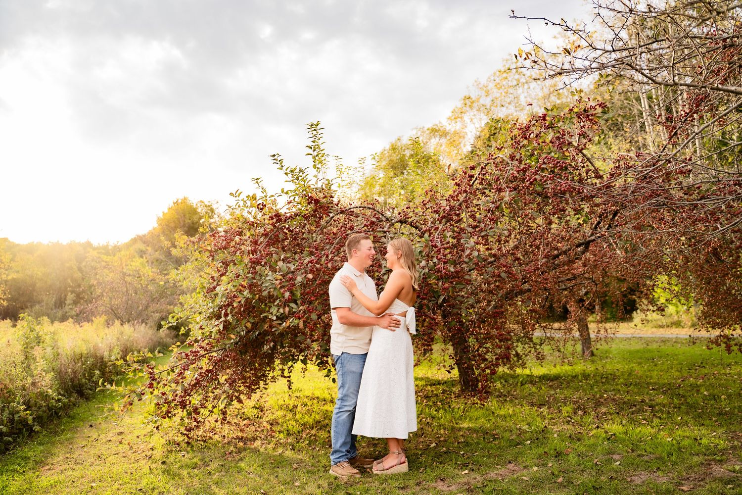 Outdoor fall engagement session in prairie of Eau Claire Wisconsin