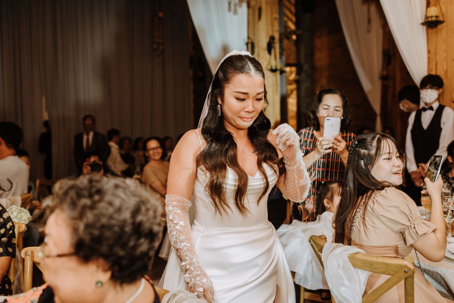 Wedding reception celebration with guests enjoying the festivities.