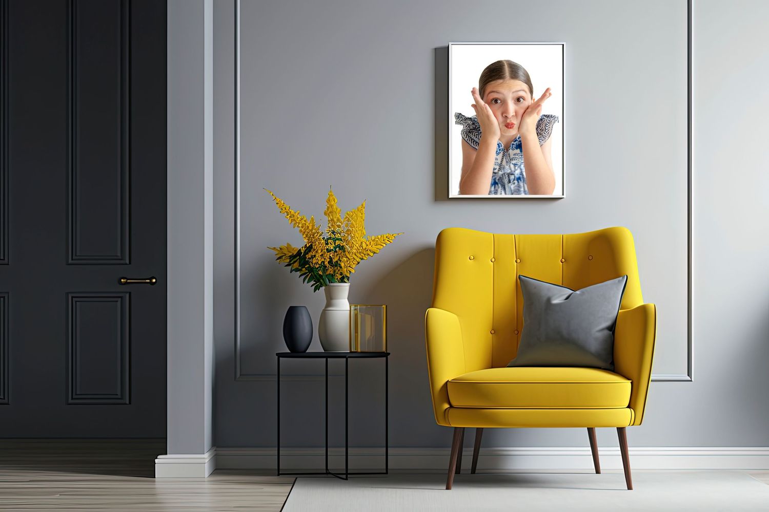 Contemporary gray room interior with yellow accent chair and framed wall art.