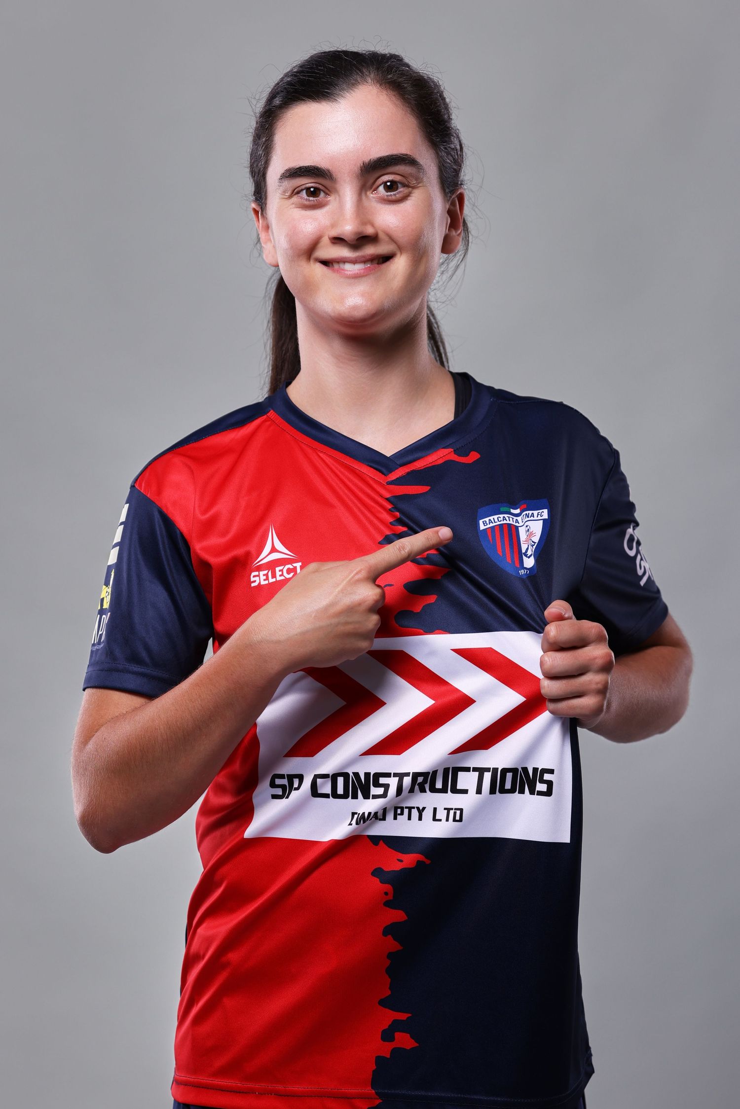Series of promotional sports uniform photos showing red and navy blue jerseys with sponsor logos and team branding.