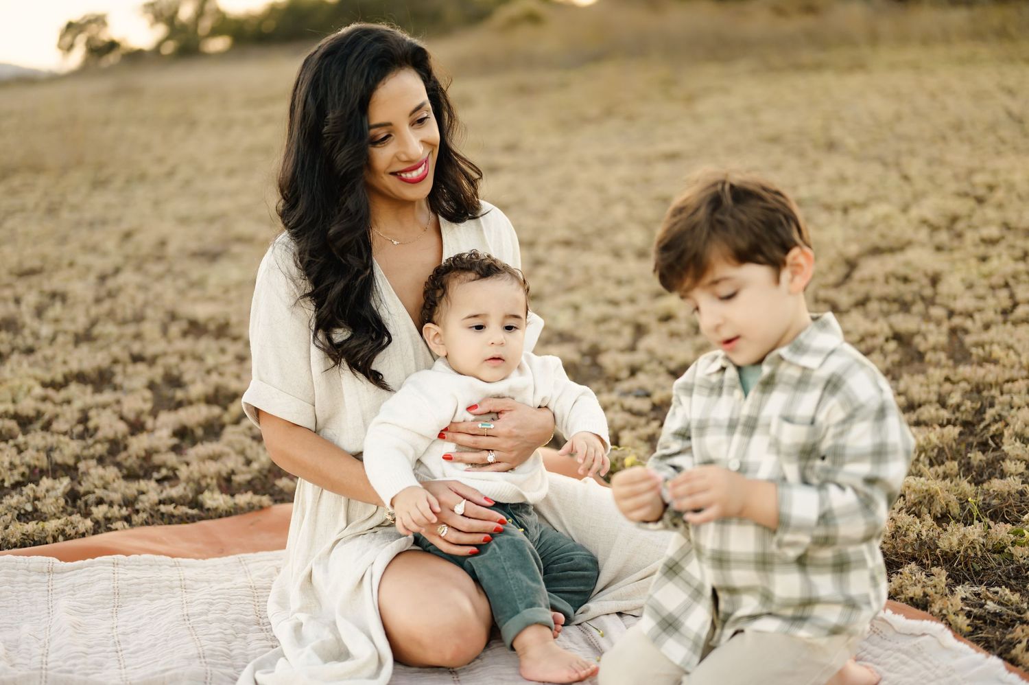 mom sitting with her two young boys during mommy & me photos by San Diego photographer, Tiffany Kelterer