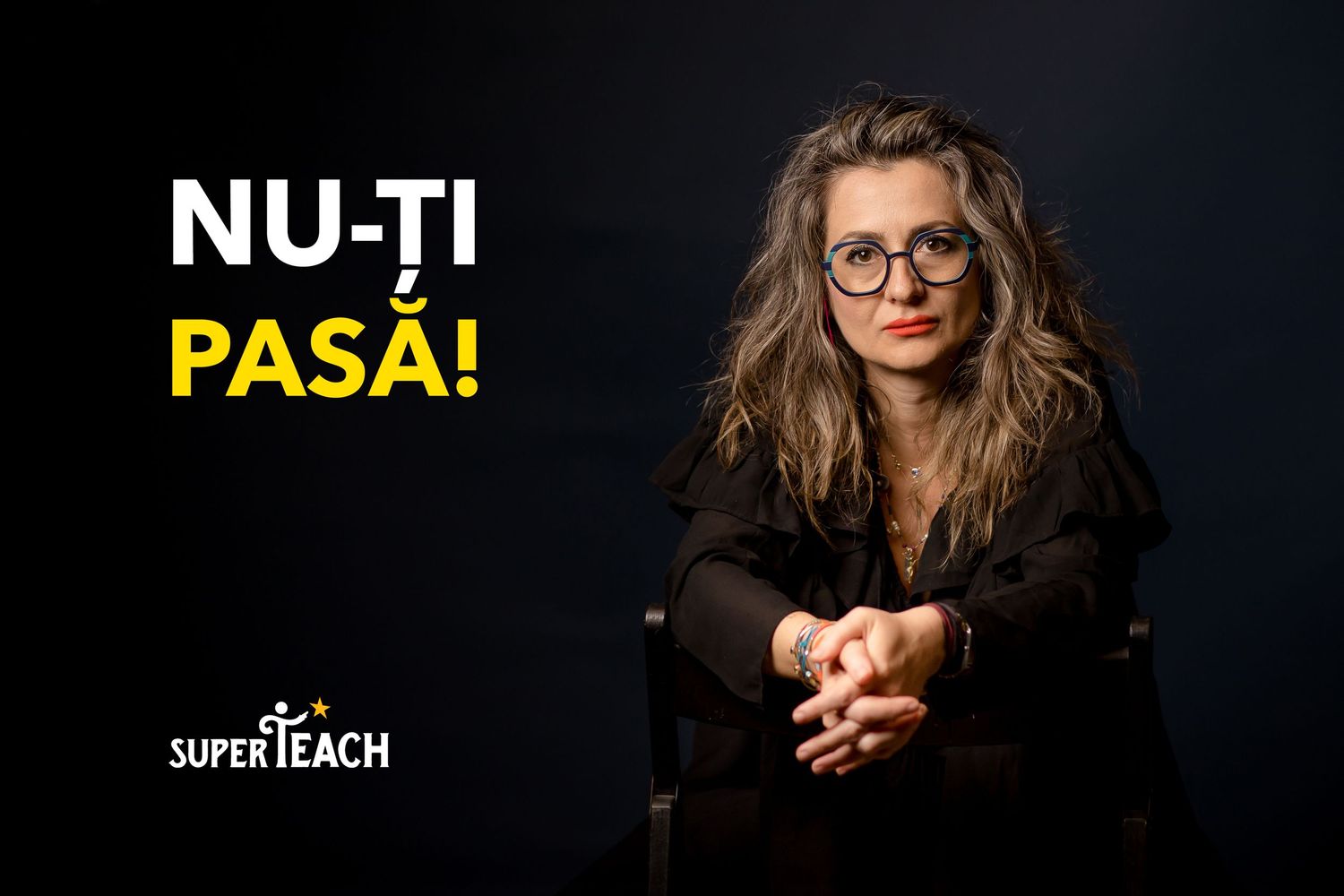 Woman in black outfit seated, with bold text NU-TI PASA and SuperTeach logo on dark background.