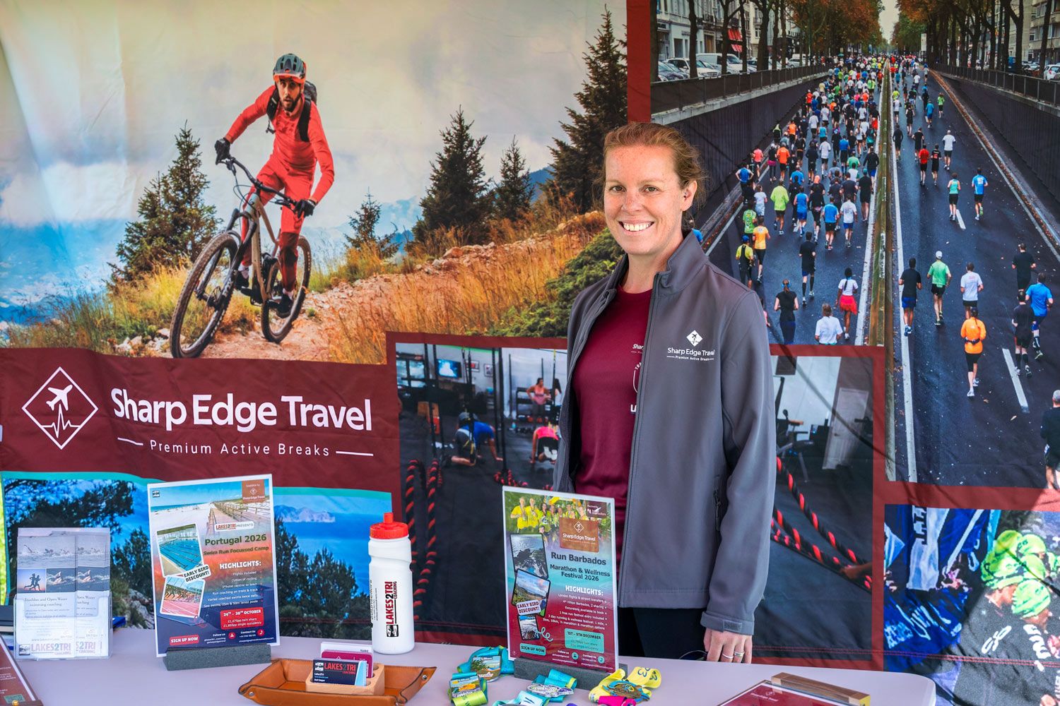 A vendor at the sporting event advertising her travel business.