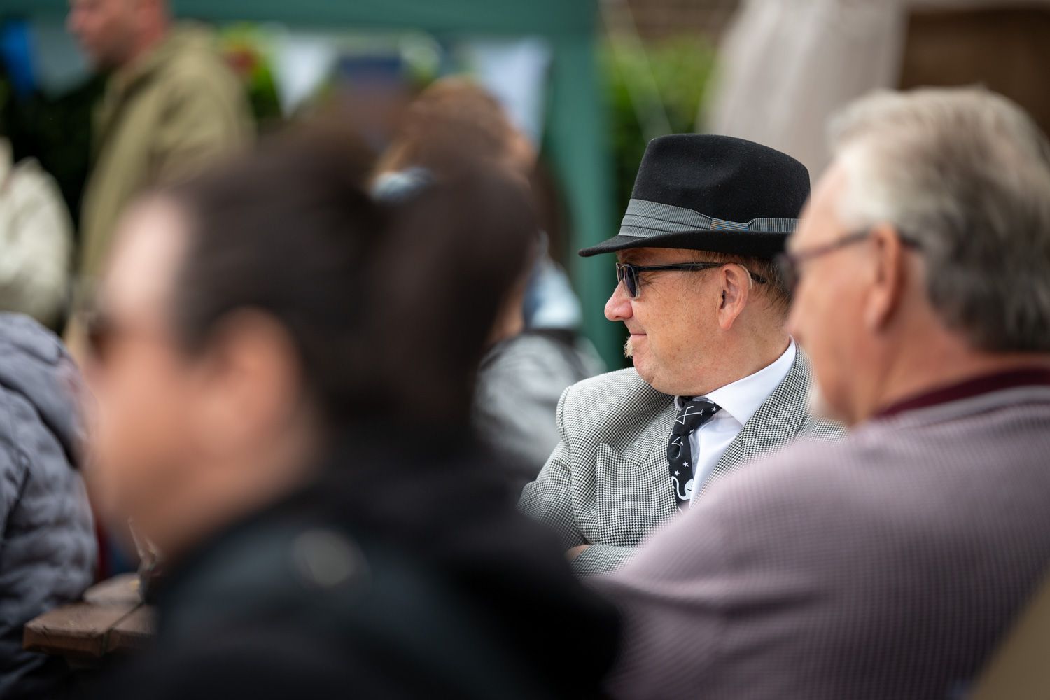 Candid shot of a member of the audience enjoying the activities.