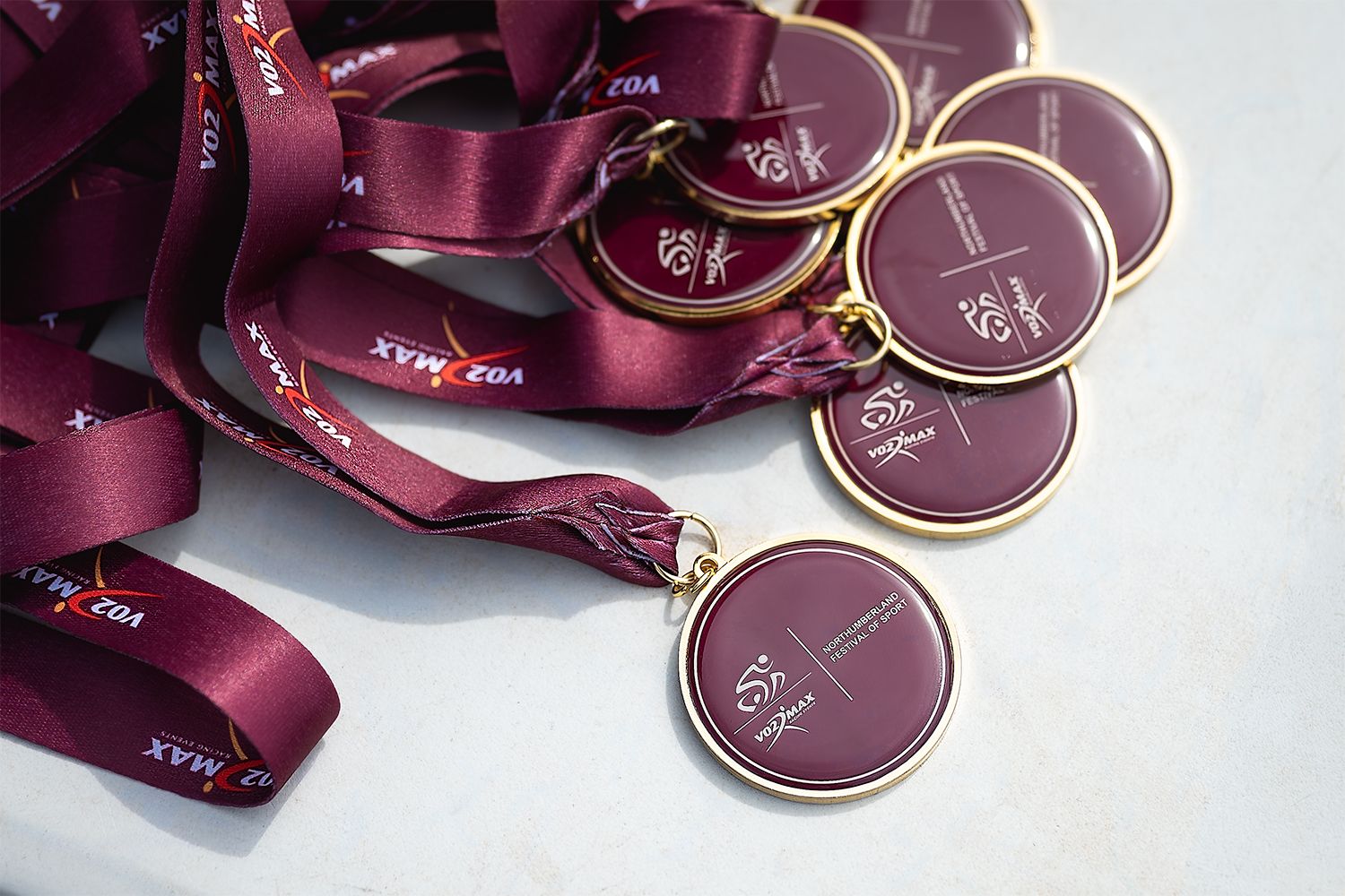 Detail shot of the winner medals of the triathlon event.