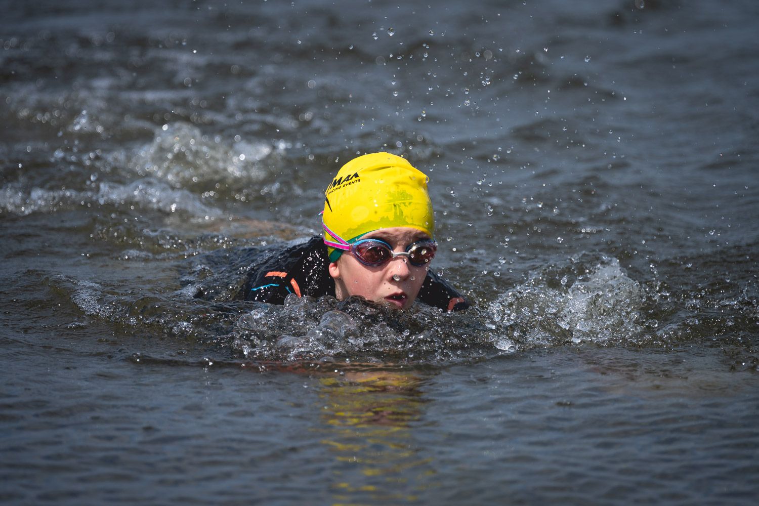 Close up shot of the first participant of the swimming race.