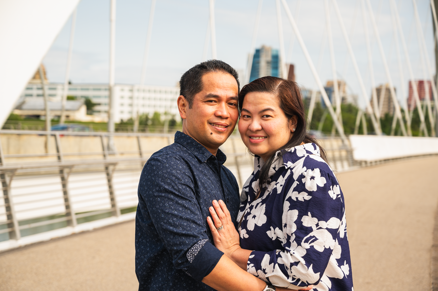 A couple embracing during a summer session in Edmonton.