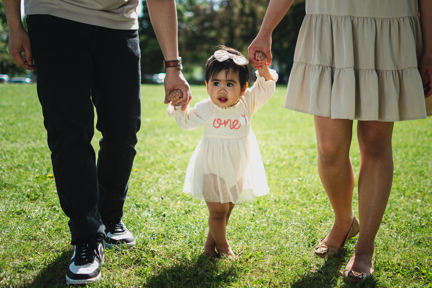 Parents walking their newborn baby during a lifestyle session in Edmonton.

For the upcoming 1-year-old birthday