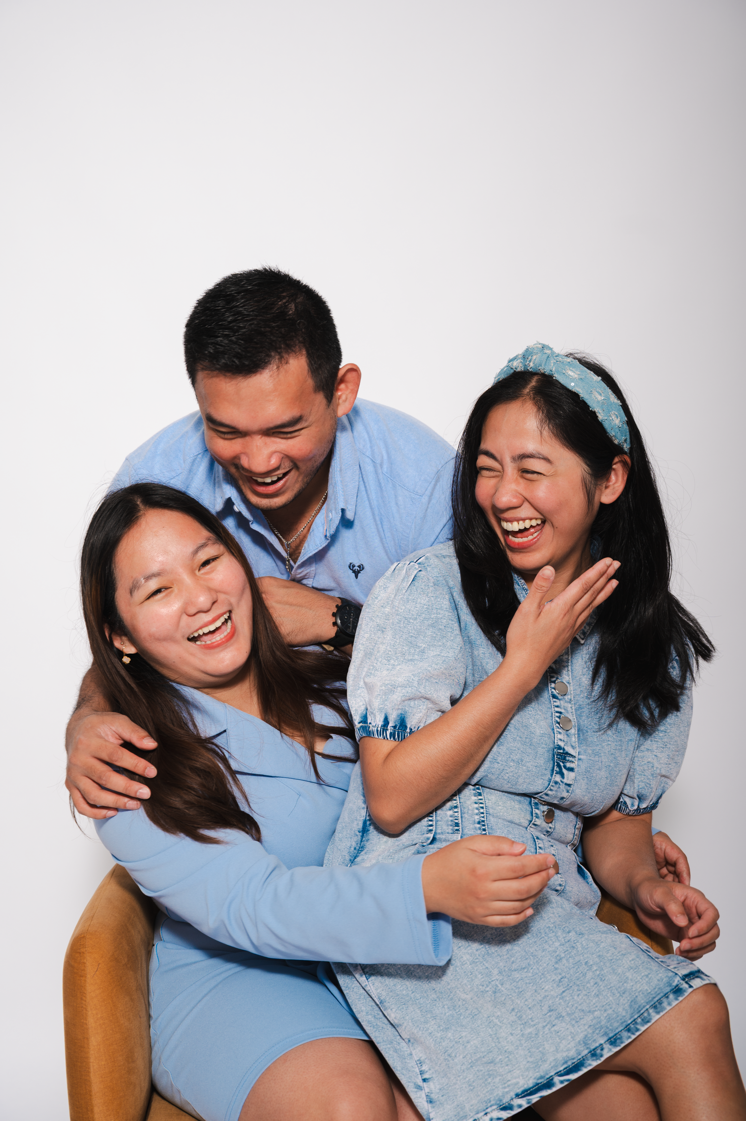 Professional studio family portrait session in Edmonton.
Siblings enjoying a studio photography session in Edmonton.