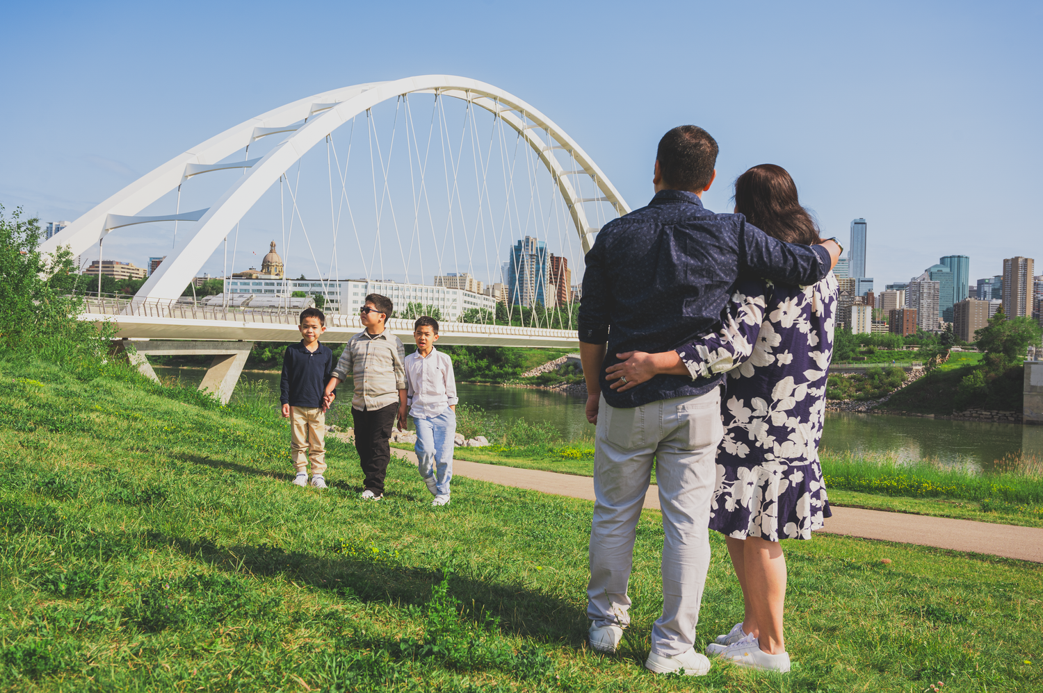 Family of five enjoying an outdoor photography session in Edmonton.

creative shot to highlight the parents love for their children