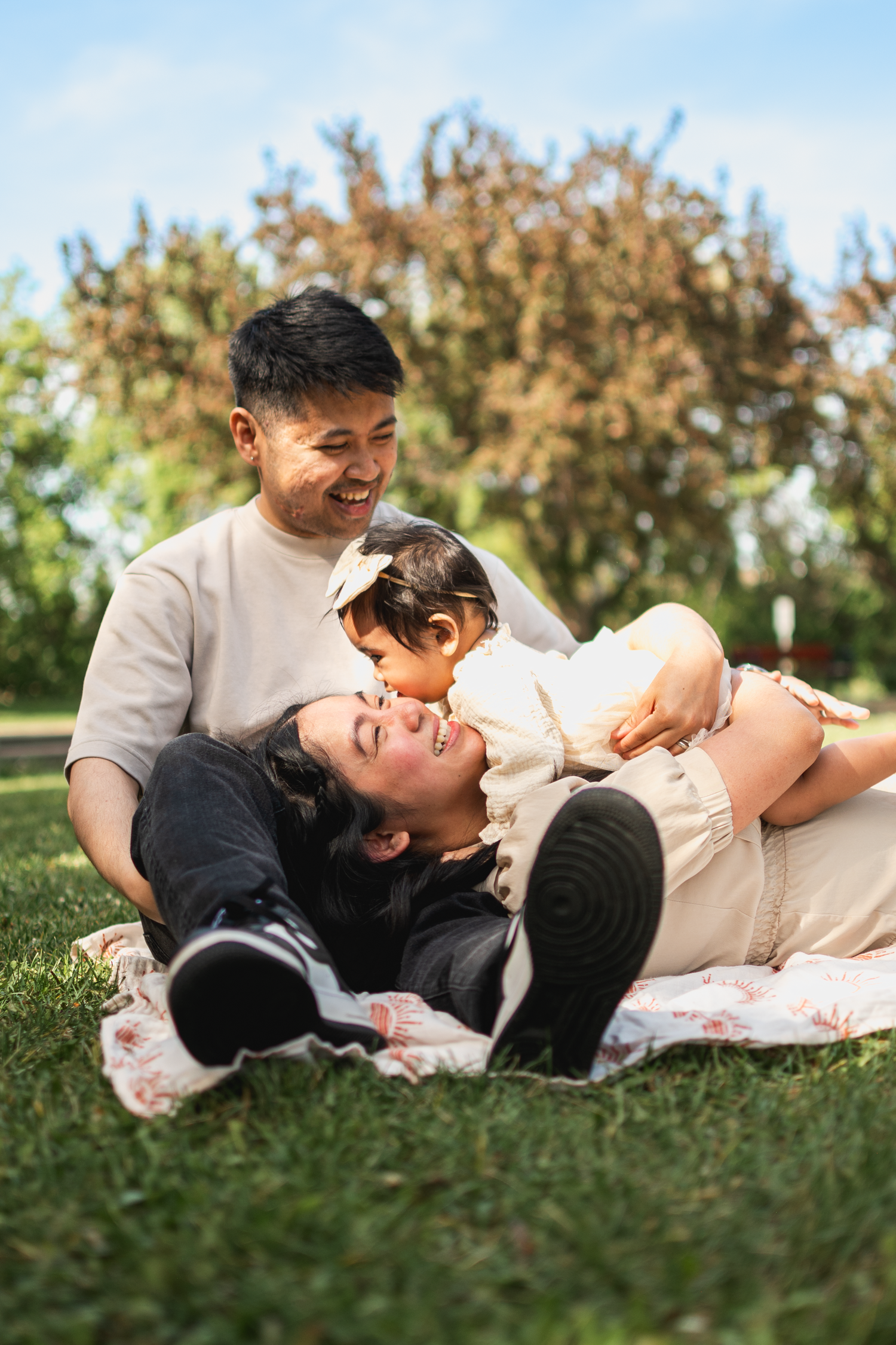 Parents walking their newborn baby during a lifestyle session in Edmonton.

For the upcoming 1-year-old birthday