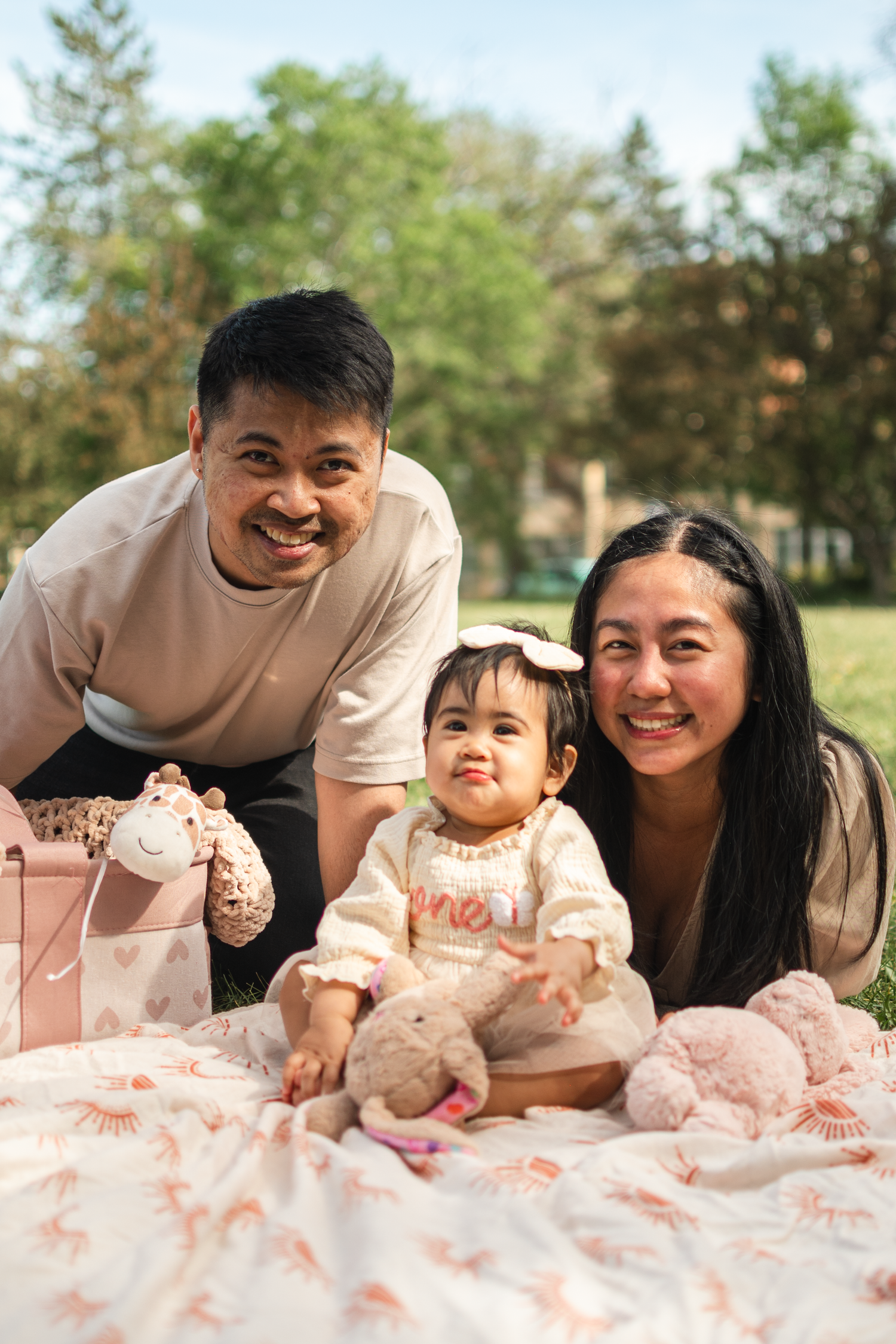 Parents posing with their newborn baby during a lifestyle session in Edmonton.

For the upcoming 1-year-old birthday