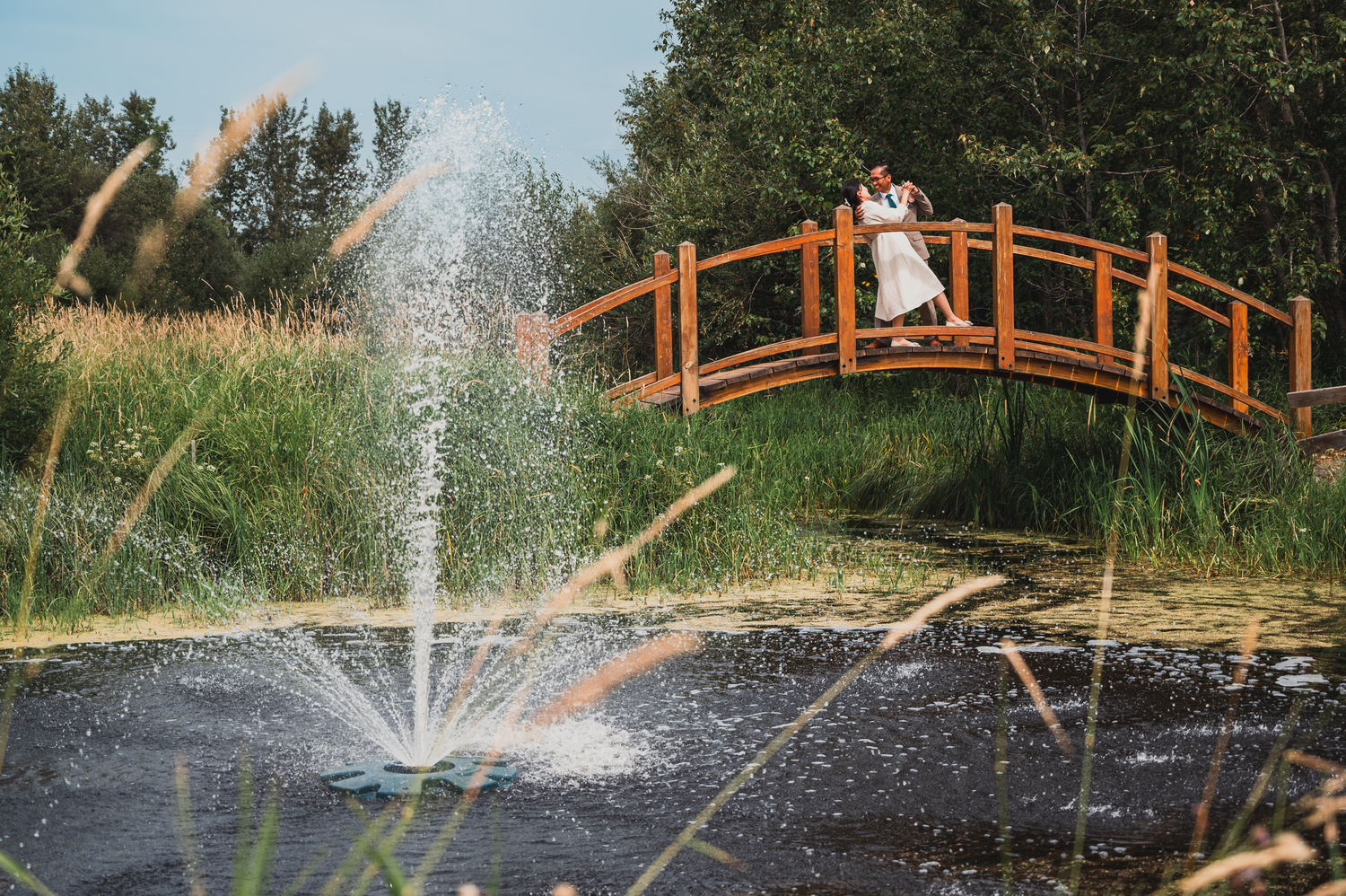 A couple posing after the wedding in Edmonton.