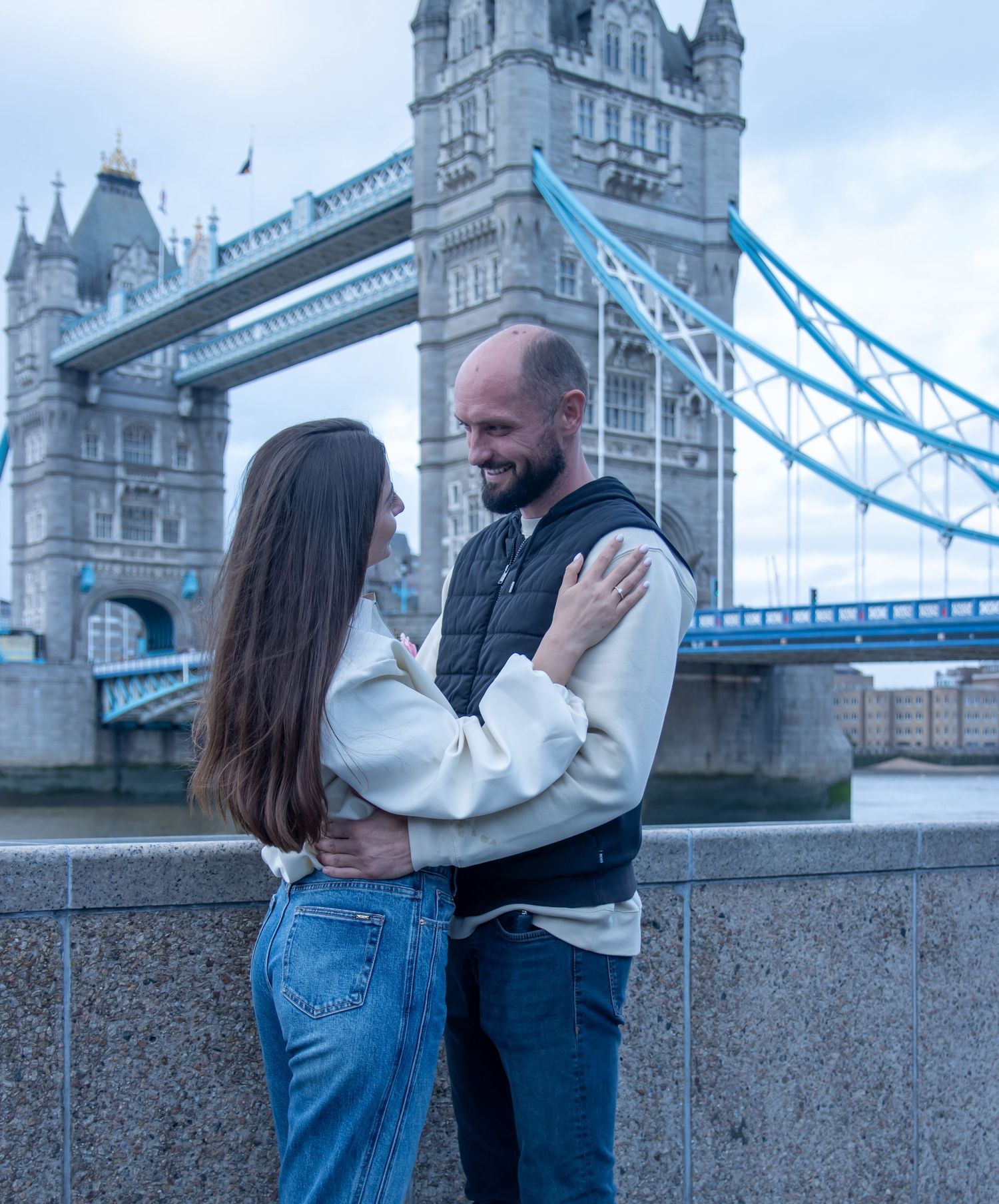 Surprise proposal by Tower Bridge in London, photographed by GGC Photography