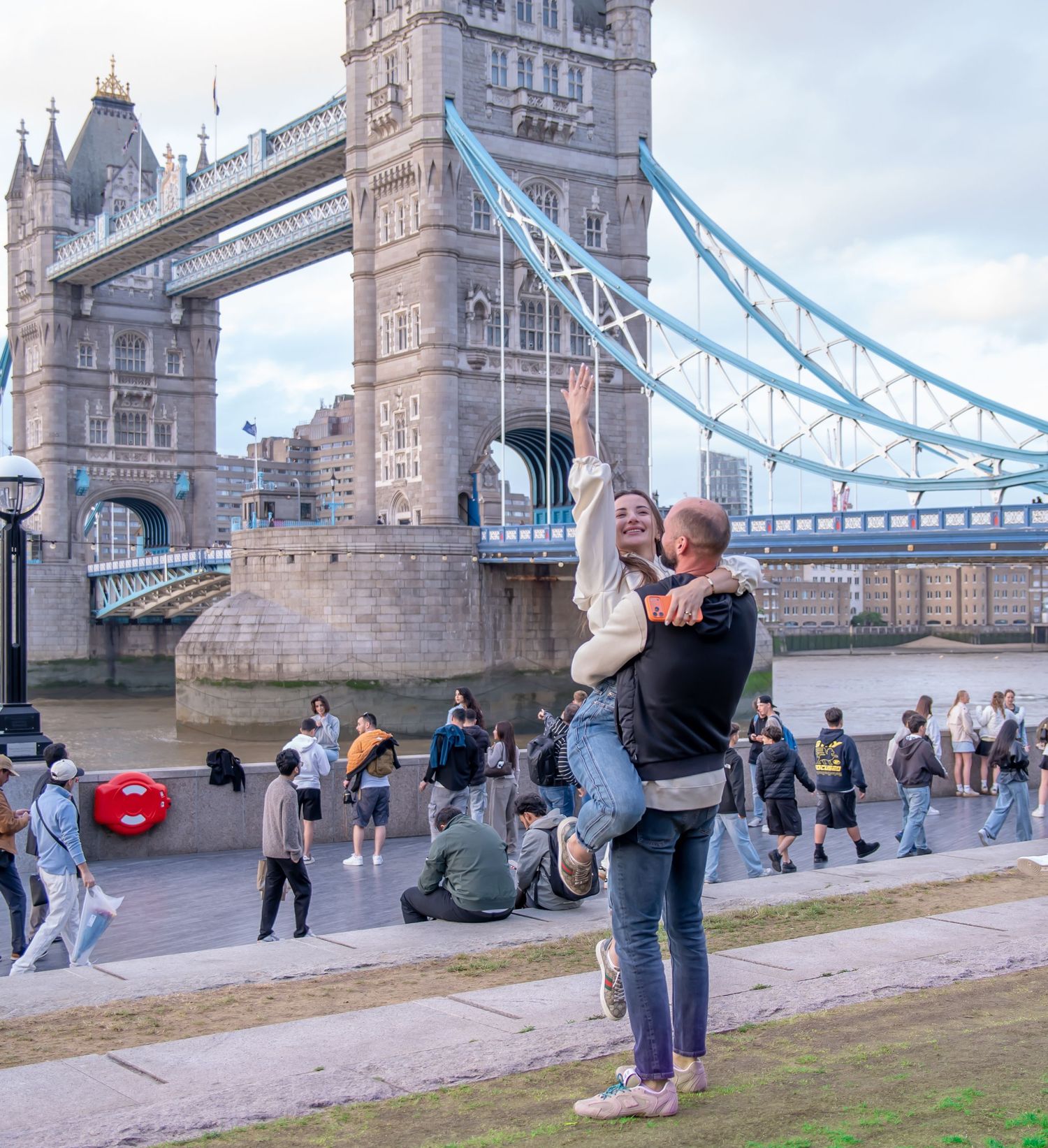Surprise proposal by Tower Bridge in London, photographed by GGC Photography
