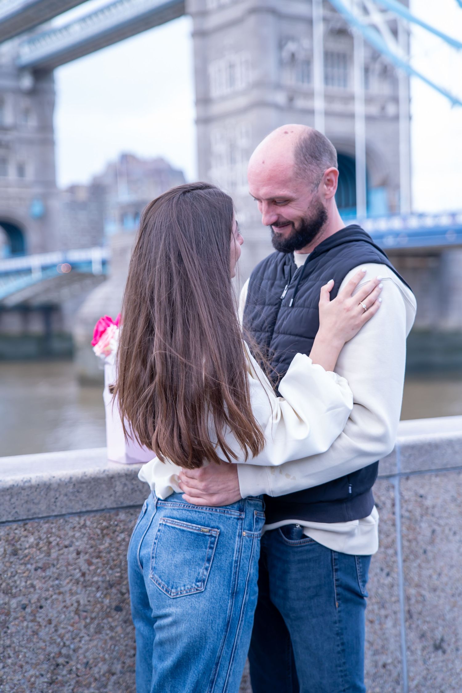 Surprise proposal by Tower Bridge in London, photographed by GGC Photography