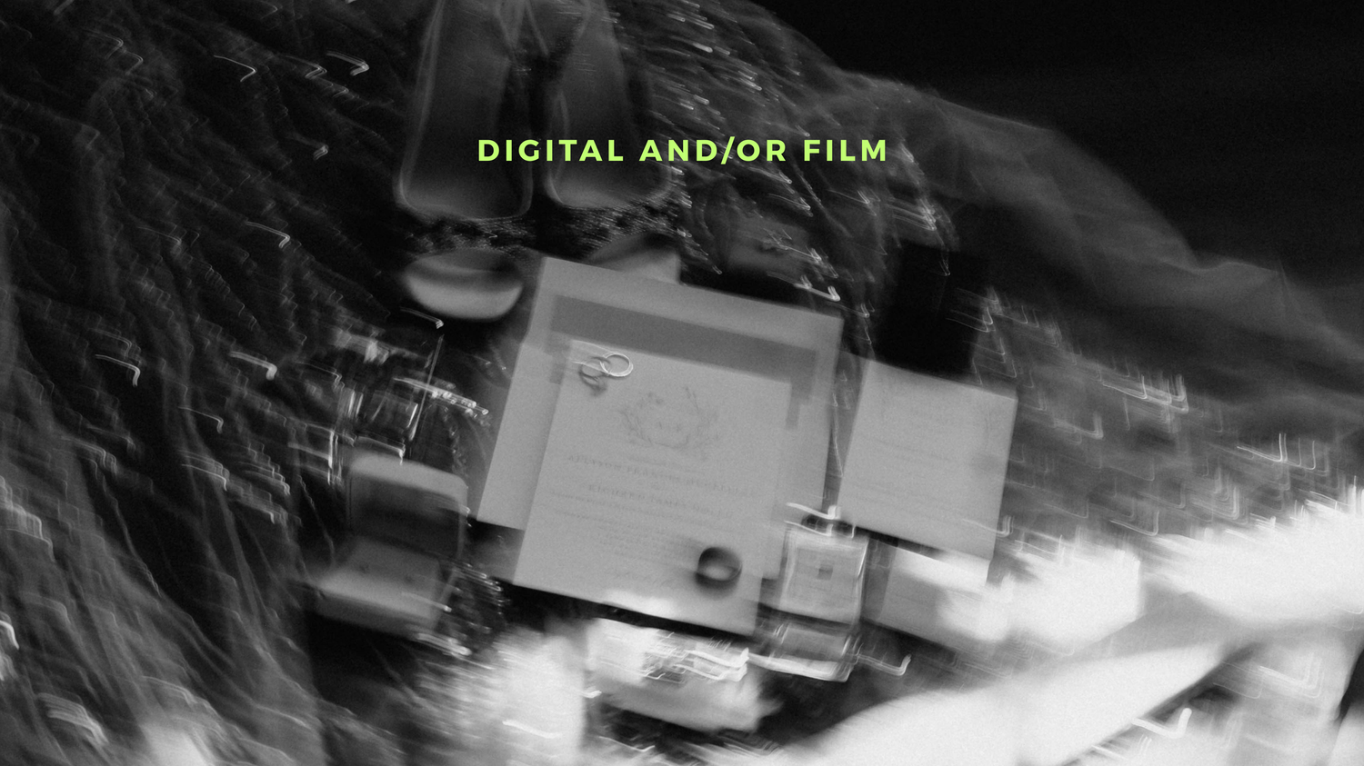 Black and white film strip showing multiple dark frames in a horizontal sequence against a light background.