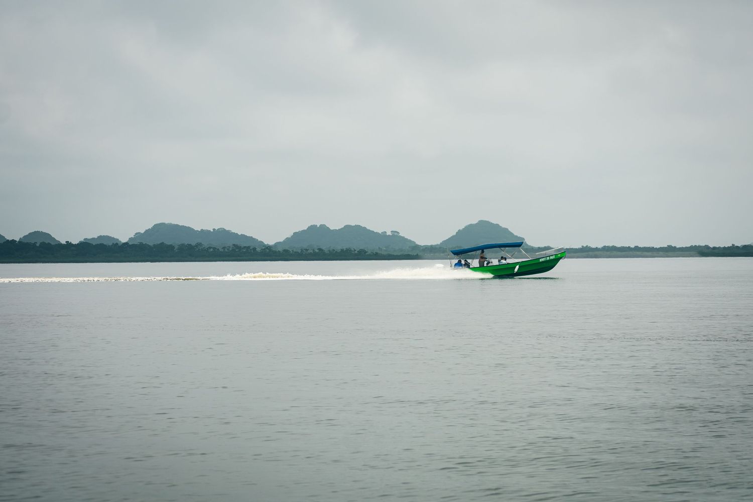 Boat_with_Mountains_in_Background.jpg