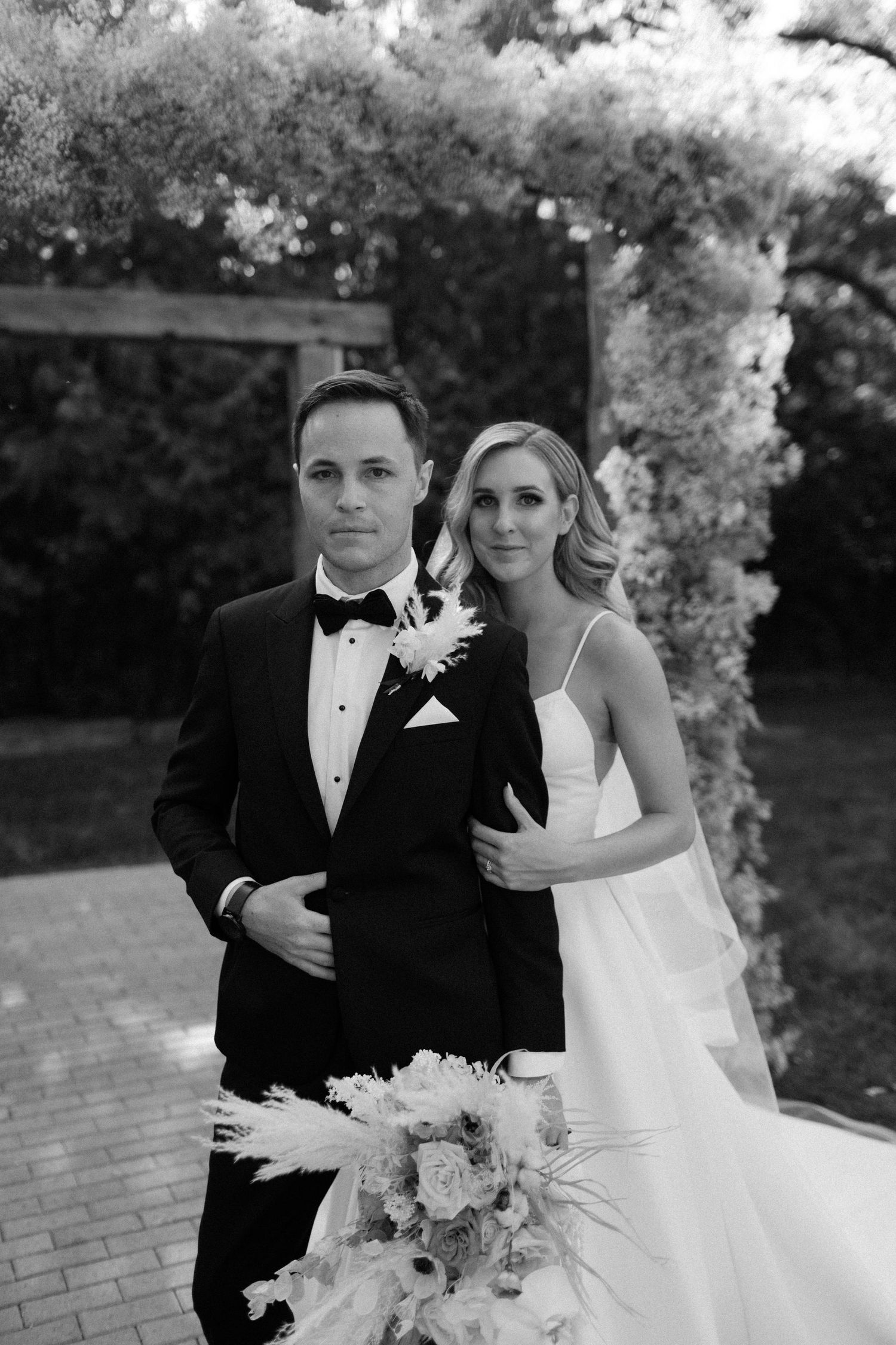 Classic black and white wedding portrait with floral decorations at Roseville Estates Ontario