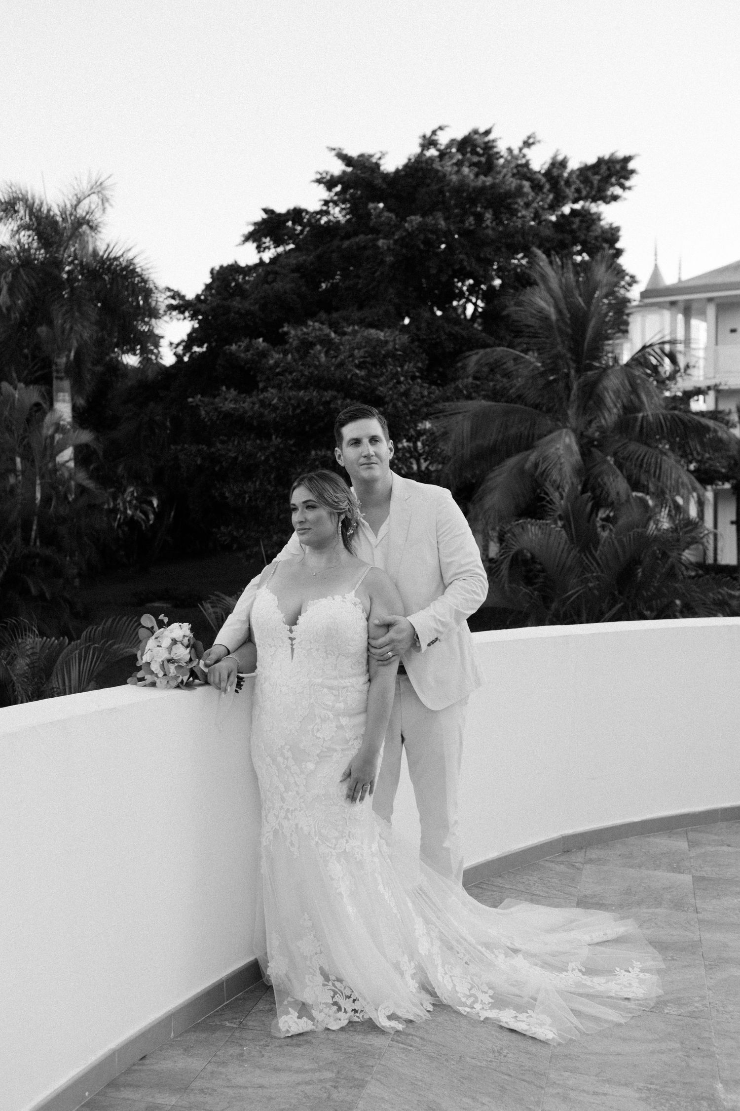 Tropical garden wedding portrait in black and white.
