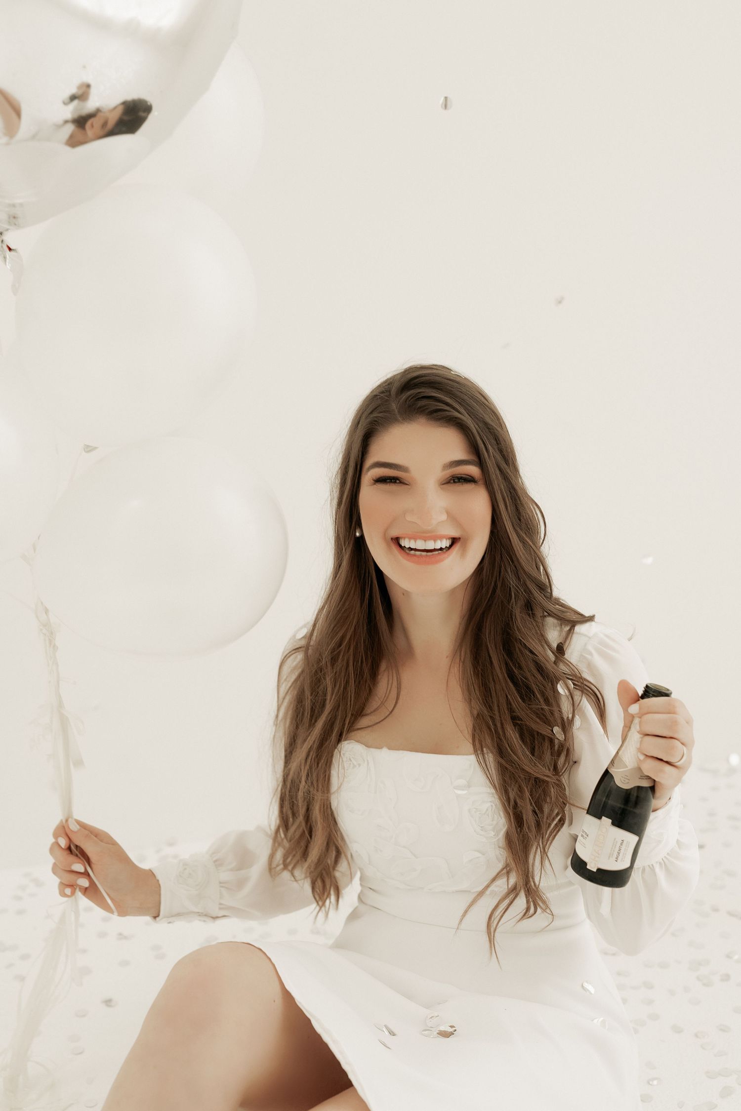 A series of joyful moments captured in white against a light background showing playful expressions and movement.
